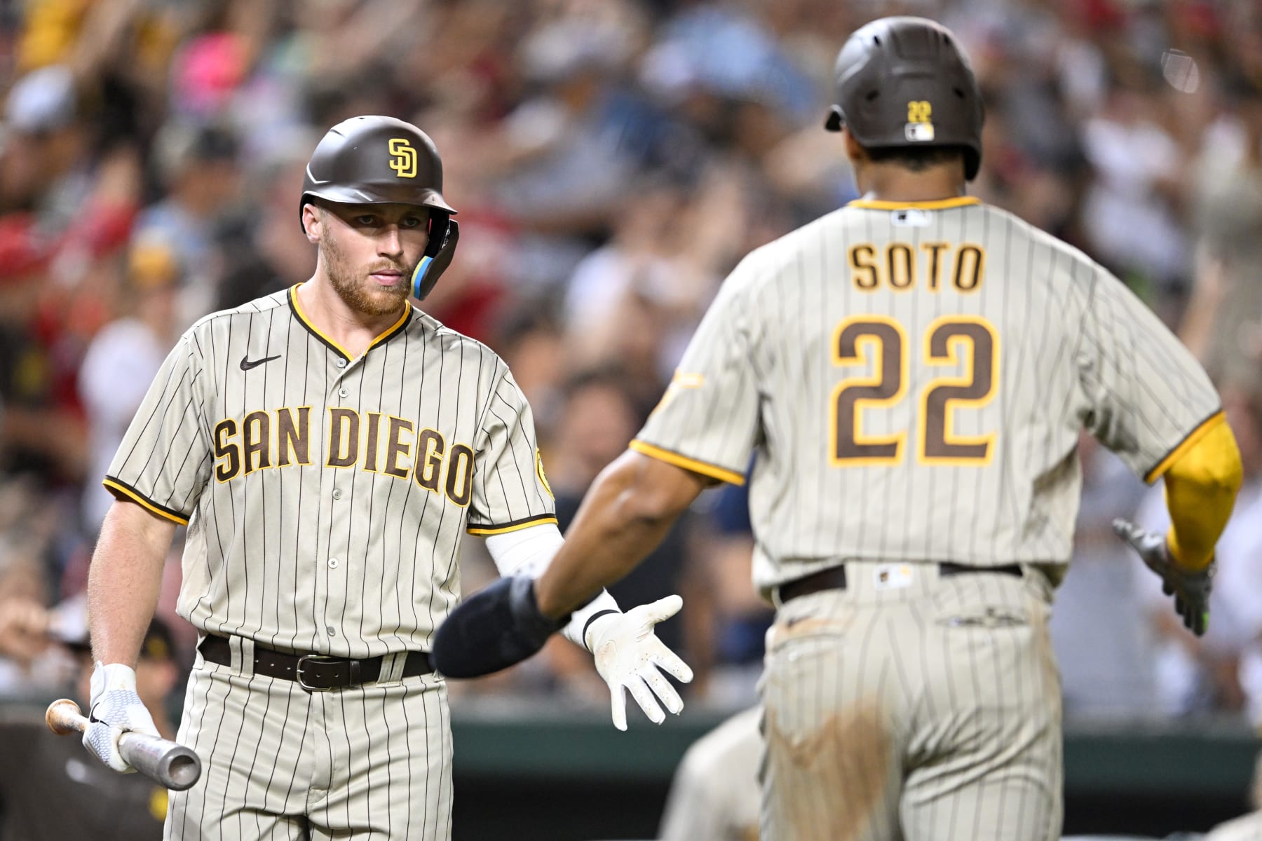 WASHINGTON, DC - AUGUST 12, 2022: Brandon Drury #17 of the San Diego Padres celebrates with Juan Soto #22 after Soto scored on a two-run double by Manny Machado during the fifth inning against the Washington Nationals at Nationals Park on August 12, 2022 in Washington, DC. (Photo by Chris Bernacchi/Diamond Images via Getty Images)