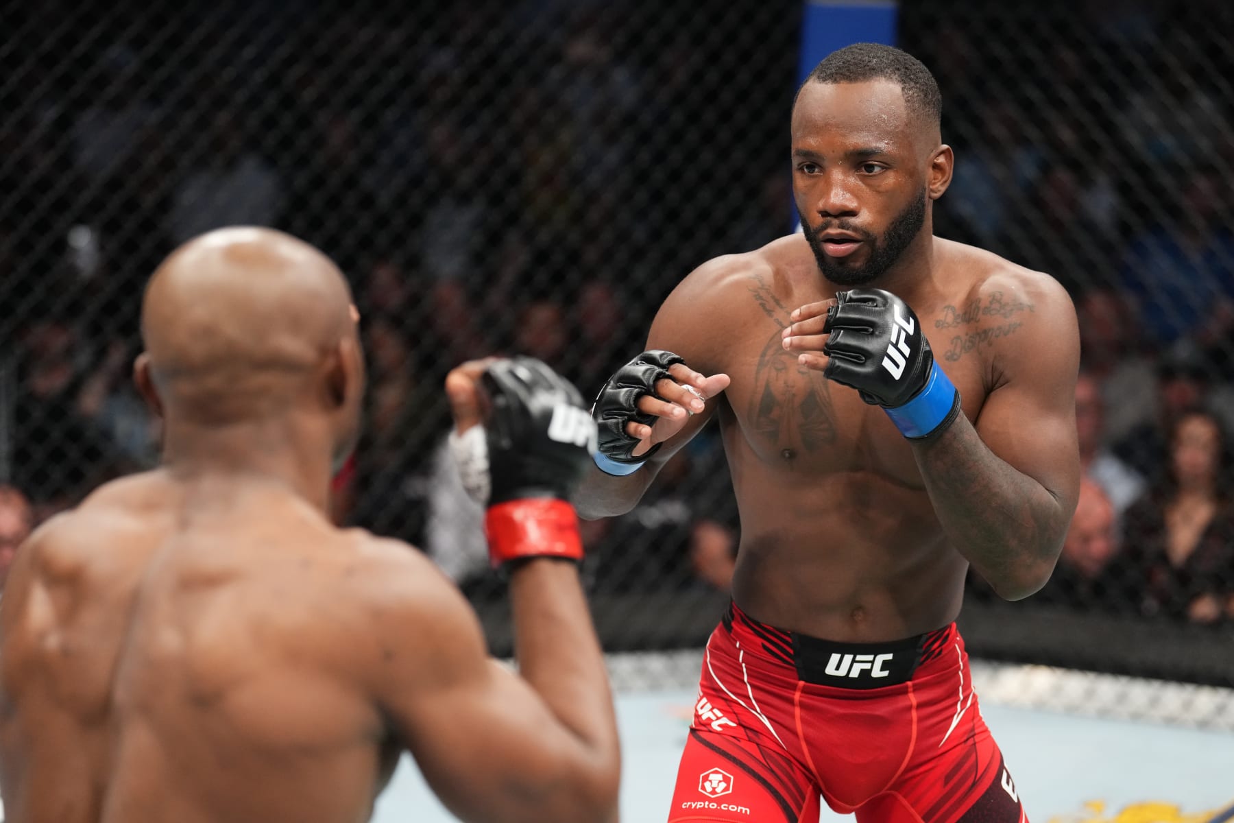 SALT LAKE CITY, UTAH - AUGUST 20: (R-L) Leon Edwards of Jamaica faces Kamaru Usman of Nigeria in the UFC welterweight championship fight during the UFC 278 event at Vivint Arena on August 20, 2022 in Salt Lake City, Utah. (Photo by Josh Hedges/Zuffa LLC)