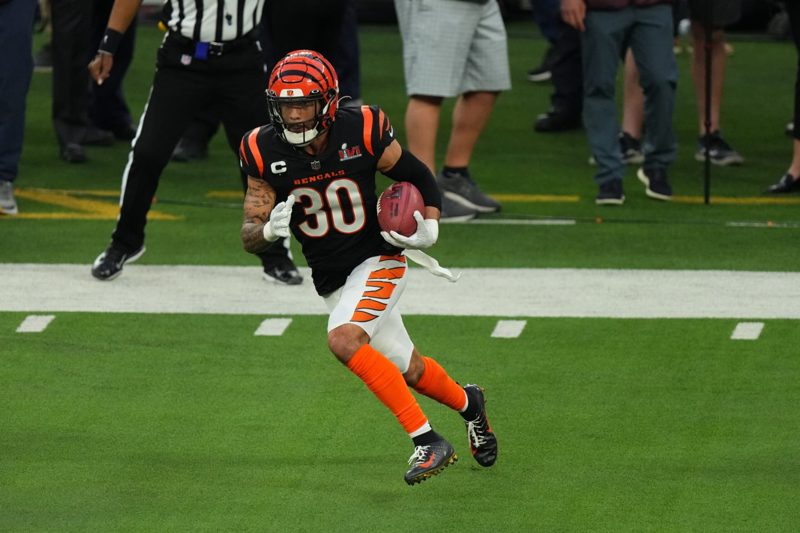 INGLEWOOD, CALIFORNIA - FEBRUARY 13: Jessie Bates #30 of the Cincinnati Bengals runs the ball during to the NFL Super Bowl LVI football game against the Los Angeles Rams at SoFi Stadium on February 13, 2022 in Inglewood, California. (Photo by Cooper Neill/Getty Images) INGLEWOOD, CALIFORNIA - FEBRUARY 13: Jessie Bates #30 of the Cincinnati Bengals runs the ball during to the NFL Super Bowl LVI football game against the Los Angeles Rams at SoFi Stadium on February 13, 2022 in Inglewood, California. (Photo by Cooper Neill/Getty Images)