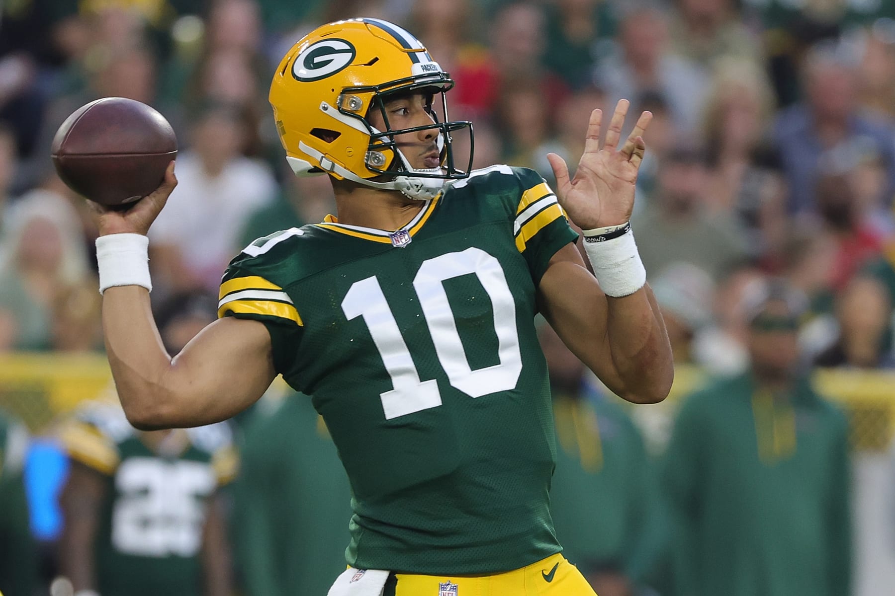 GREEN BAY, WISCONSIN - AUGUST 19: Jordan Love #10 of the Green Bay Packers looks to pass against the New Orleans Saints during the first half of a preseason game at Lambeau Field on August 19, 2022 in Green Bay, Wisconsin. (Photo by Stacy Revere/Getty Images)