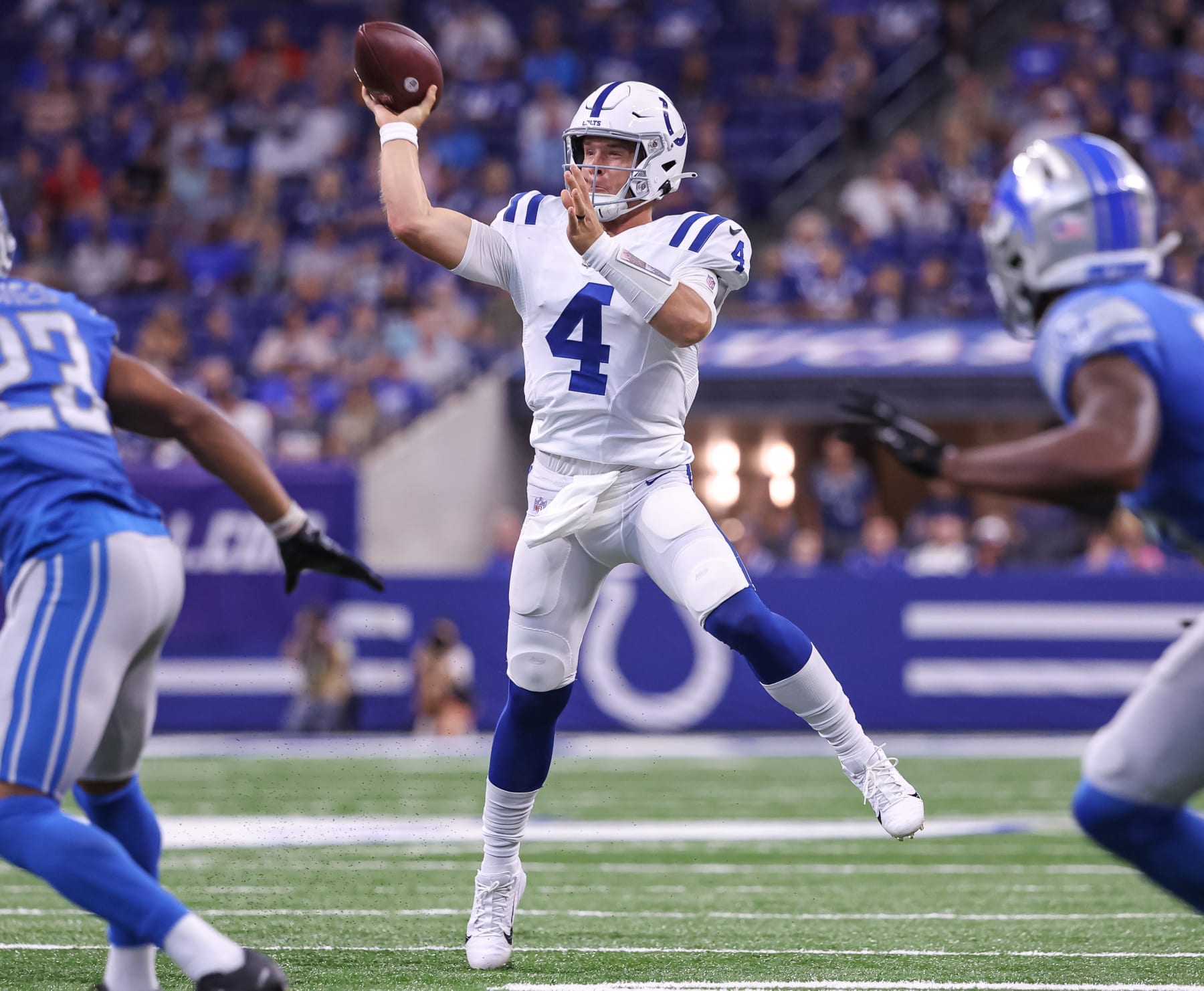 INDIANAPOLIS, IN - AUGUST 20: Sam Ehlinger #4 of Indianapolis Colts throws the ball during the first half against the Detroit Lions at Lucas Oil Stadium on August 20, 2022 in Indianapolis, Indiana. (Photo by Michael Hickey/Getty Images)