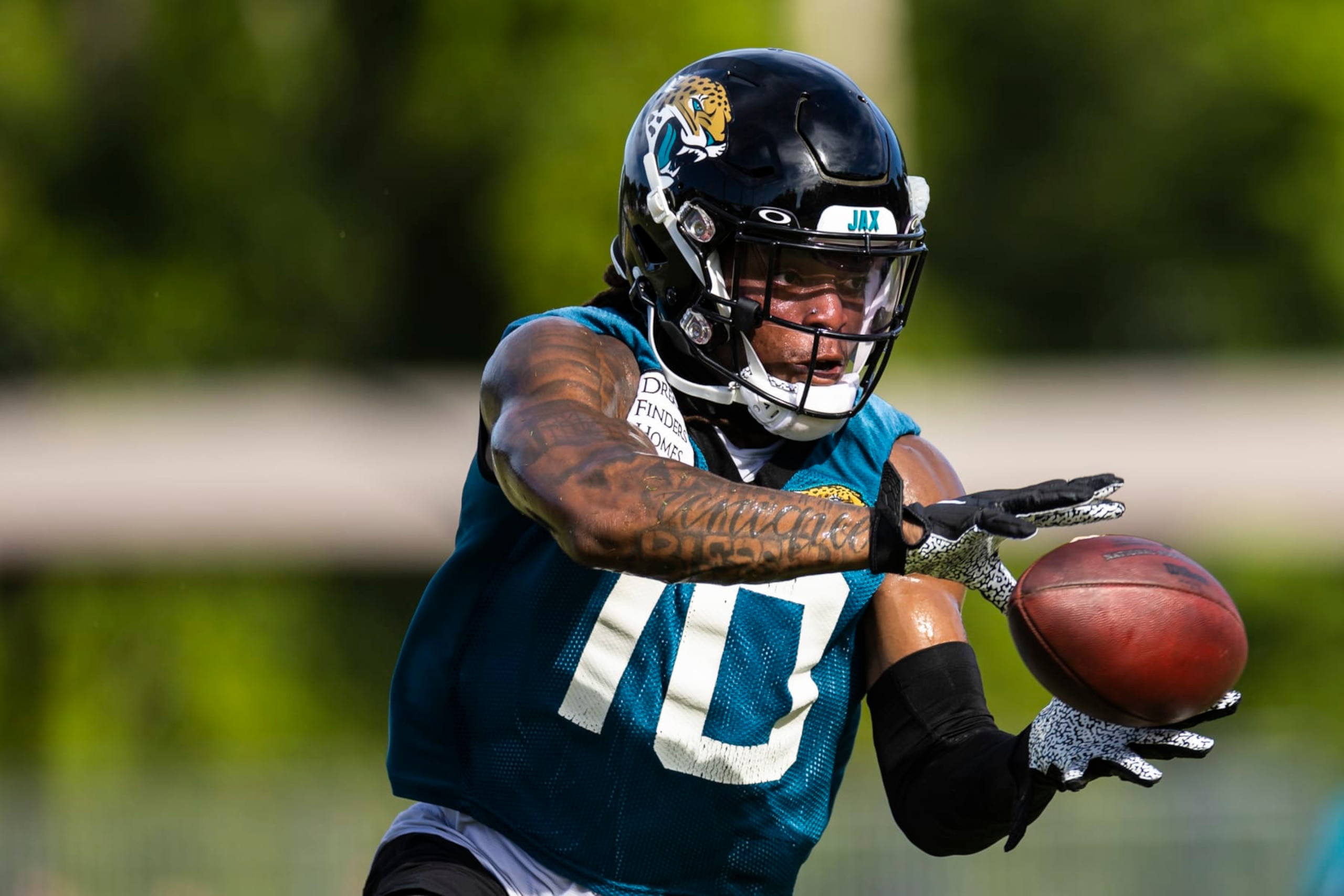 JACKSONVILLE, FLORIDA - JULY 26: Laviska Shenault Jr. #10 of the Jacksonville Jaguars catches a pass during Training camp on July 26, 2022 at Episcopal High School in Jacksonville, Florida. (Photo by James Gilbert/Getty Images) JACKSONVILLE, FLORIDA - JULY 26: Laviska Shenault Jr. #10 of the Jacksonville Jaguars catches a pass during Training camp on July 26, 2022 at Episcopal High School in Jacksonville, Florida. (Photo by James Gilbert/Getty Images)