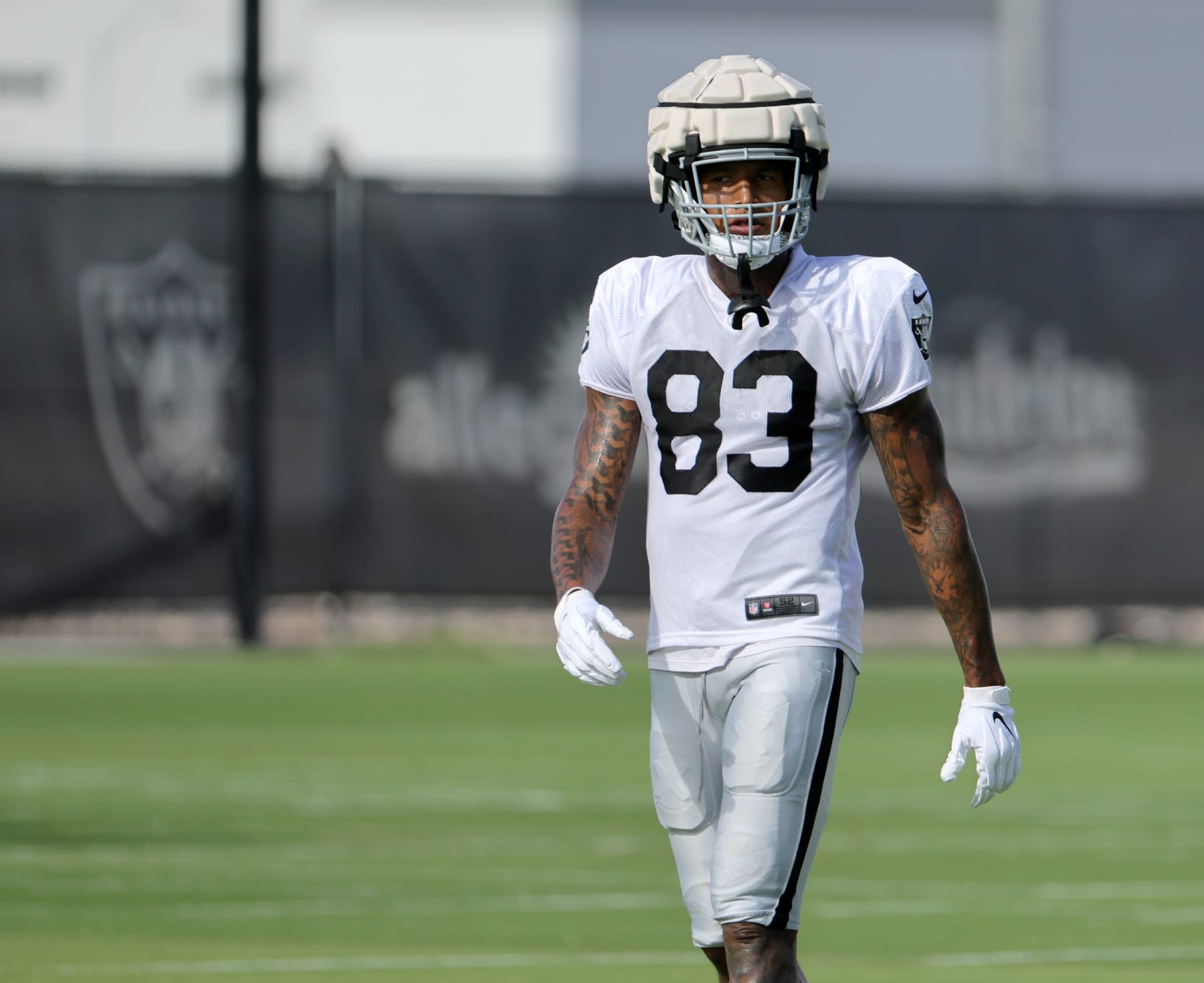 HENDERSON, NEVADA - JULY 27: Tight end Darren Waller #83 of the Las Vegas Raiders walks on a field during the team's first fully padded practice during training camp at the Las Vegas Raiders Headquarters/Intermountain Healthcare Performance Center on July 27, 2022 in Henderson, Nevada. (Photo by Ethan Miller/Getty Images)