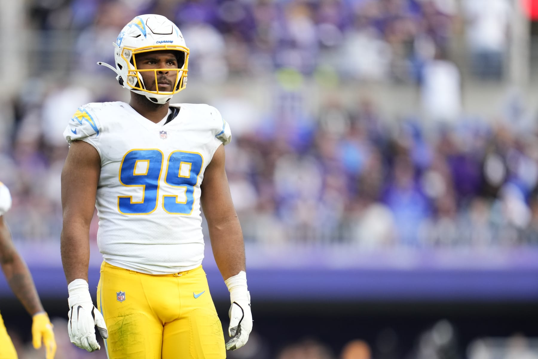 BALTIMORE, MARYLAND - OCTOBER 17: Jerry Tillery #99 of the Los Angeles Chargers gets set against the during to an NFL game against the Baltimore Raven at M&T Bank Stadium on October 17, 2021 in Baltimore, Maryland. (Photo by Cooper Neill/Getty Images)
