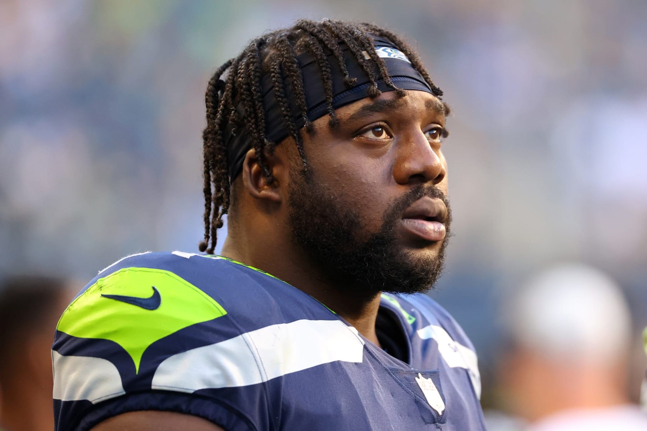 SEATTLE, WASHINGTON - AUGUST 28: L.J. Collier #91 of the Seattle Seahawks looks on during the NFL preseason game against the Los Angeles Chargers at Lumen Field on August 28, 2021 in Seattle, Washington. (Photo by Abbie Parr/Getty Images) SEATTLE, WASHINGTON - AUGUST 28: L.J. Collier #91 of the Seattle Seahawks looks on during the NFL preseason game against the Los Angeles Chargers at Lumen Field on August 28, 2021 in Seattle, Washington. (Photo by Abbie Parr/Getty Images)