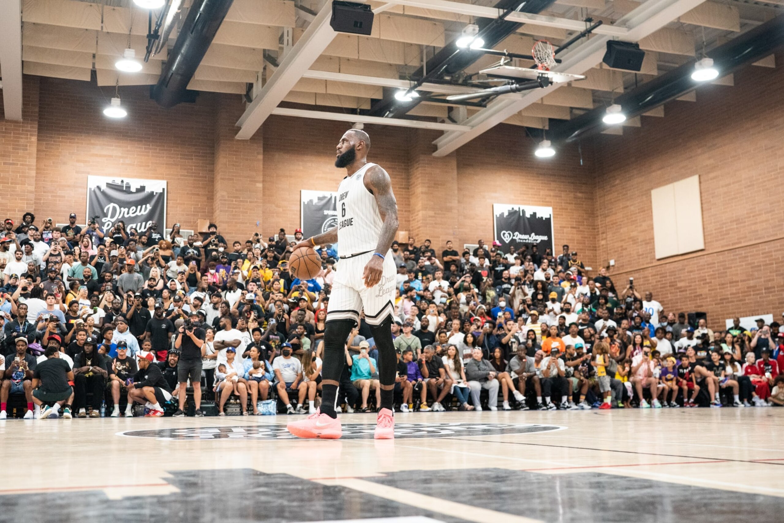 LOS ANGELES, CALIFORNIA - JULY 16: LeBron James handles the ball at the Drew League Pro-Am on July 16, 2022 in Los Angeles, California. (Photo by Cassy Athena/Getty Images) LOS ANGELES, CALIFORNIA - JULY 16: LeBron James handles the ball at the Drew League Pro-Am on July 16, 2022 in Los Angeles, California. (Photo by Cassy Athena/Getty Images)