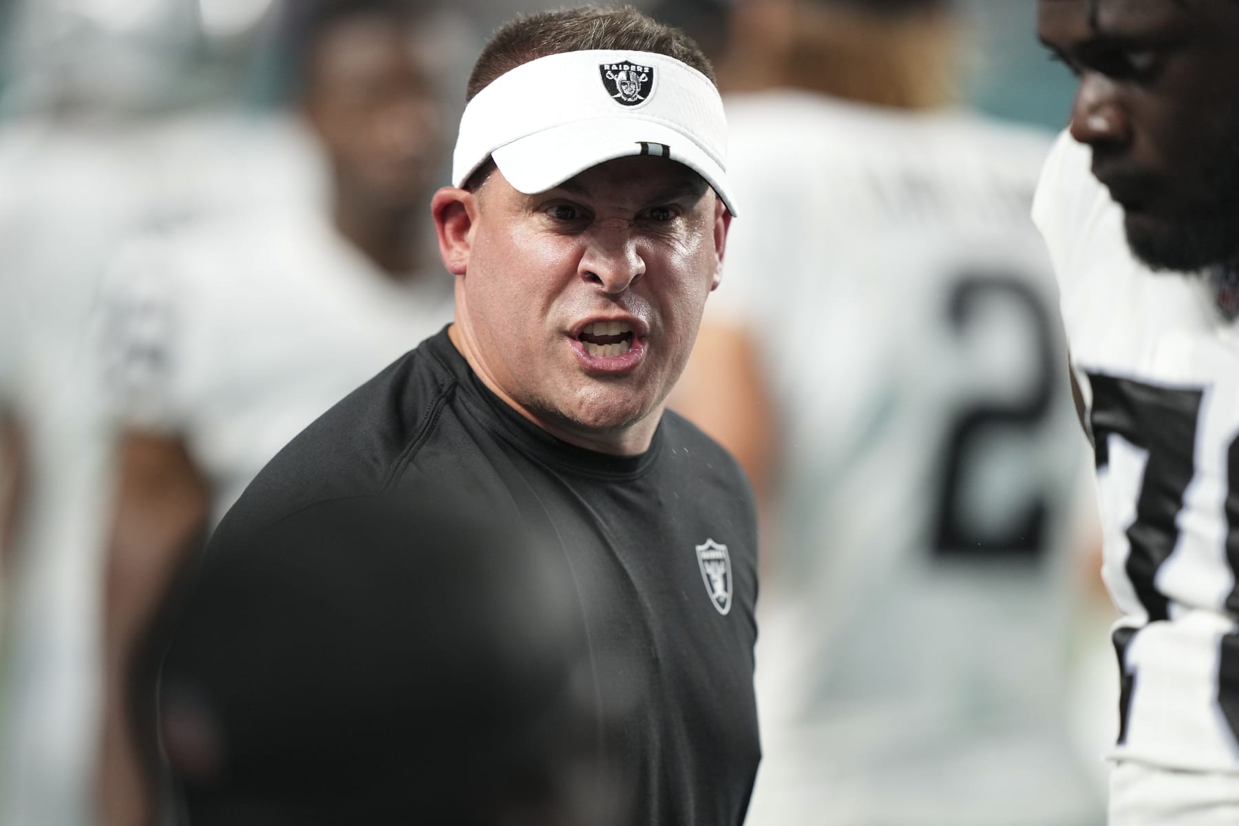 MIAMI GARDENS, FLORIDA - AUGUST 20: Head Coach Josh McDaniels of the Las Vegas Raiders on the sidelines during the first half of the game against the Miami Dolphins at Hard Rock Stadium on August 20, 2022 in Miami Gardens, Florida. (Photo by Eric Espada/Getty Images)