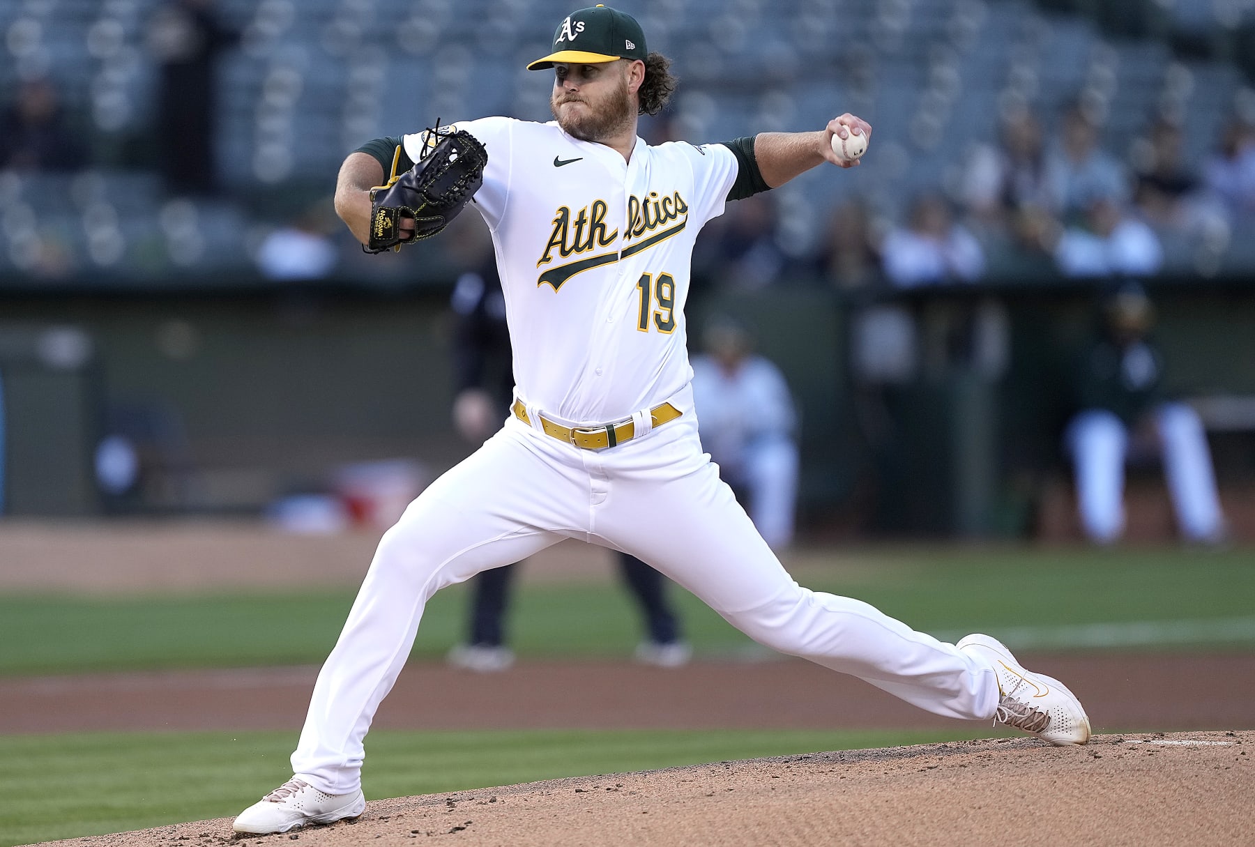 OAKLAND, CALIFORNIA - AUGUST 08: Cole Irvin #19 of the Oakland Athletics pitches against the Los Angeles Angels in the top of the first inning at RingCentral Coliseum on August 08, 2022 in Oakland, California. (Photo by Thearon W. Henderson/Getty Images)