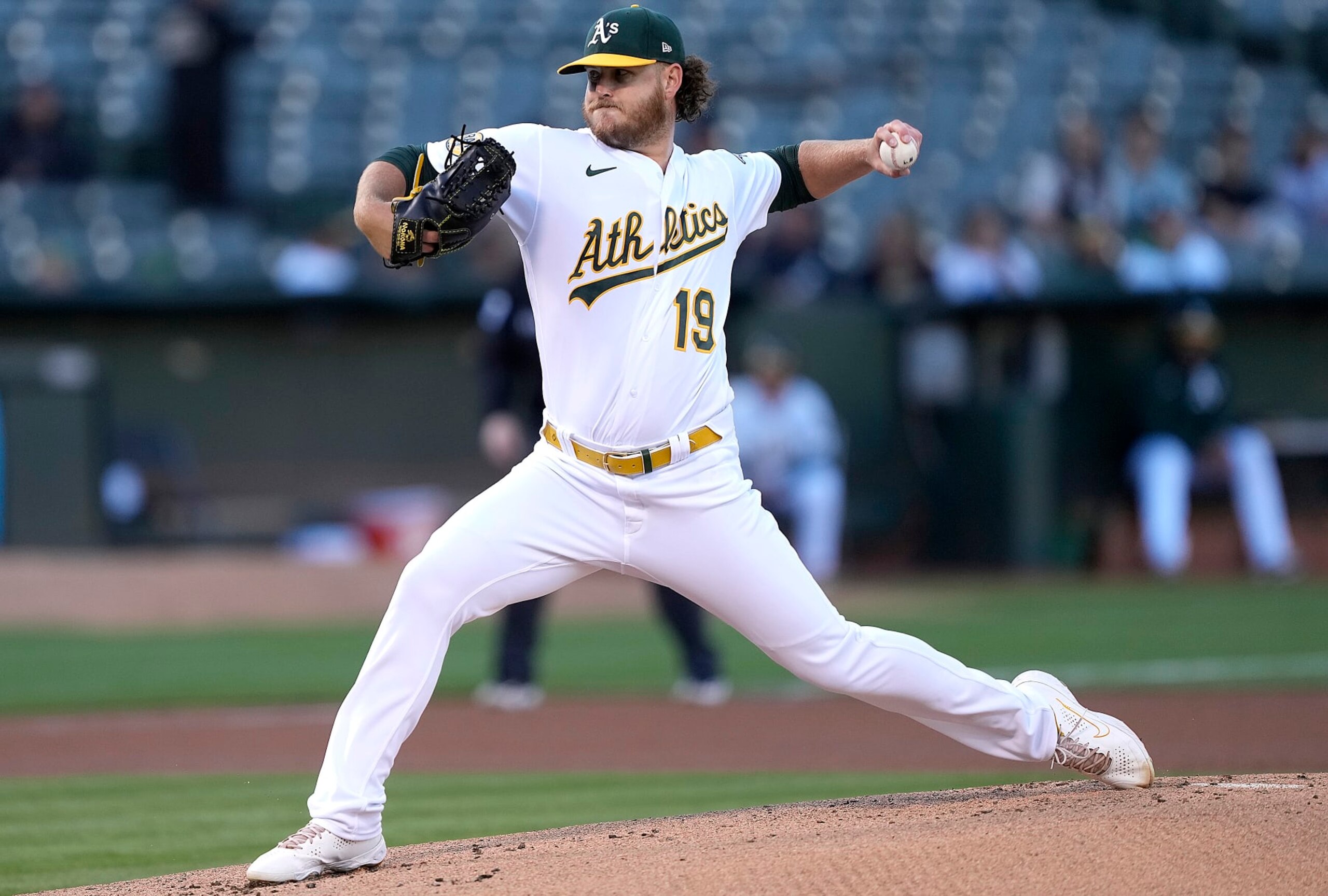 OAKLAND, CALIFORNIA - AUGUST 08: Cole Irvin #19 of the Oakland Athletics pitches against the Los Angeles Angels in the top of the first inning at RingCentral Coliseum on August 08, 2022 in Oakland, California. (Photo by Thearon W. Henderson/Getty Images)