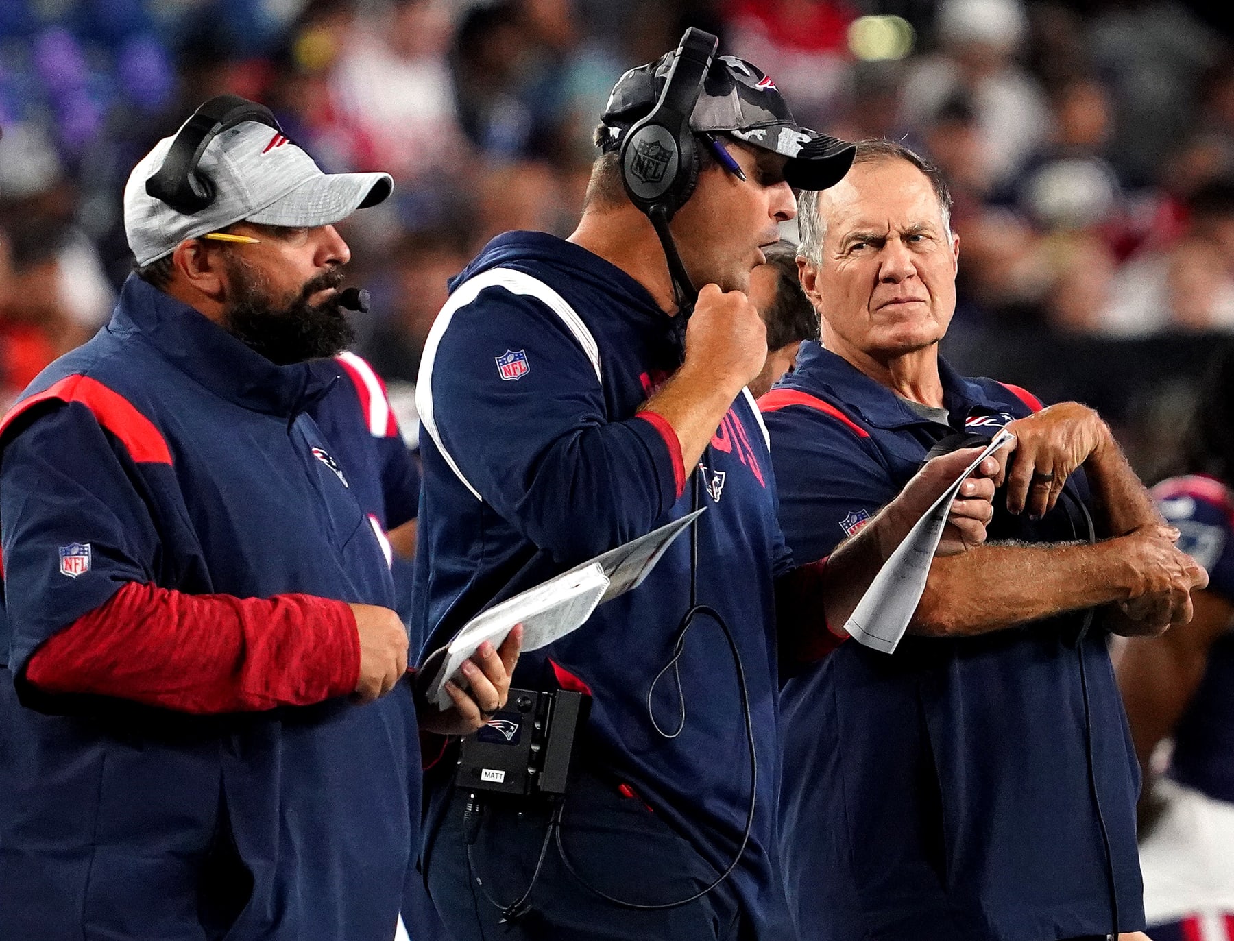 Foxborough, MA - August 11: Matt Patricia, senior football advisor/offensive line coach, Joe Judge, offensive assistant/quarterbacks coach and 
Bill Belichick, head coach of the New England Patriots, take in the teams first preseason game against the New York Giants. (Photo by Barry Chin/The Boston Globe via Getty Images)