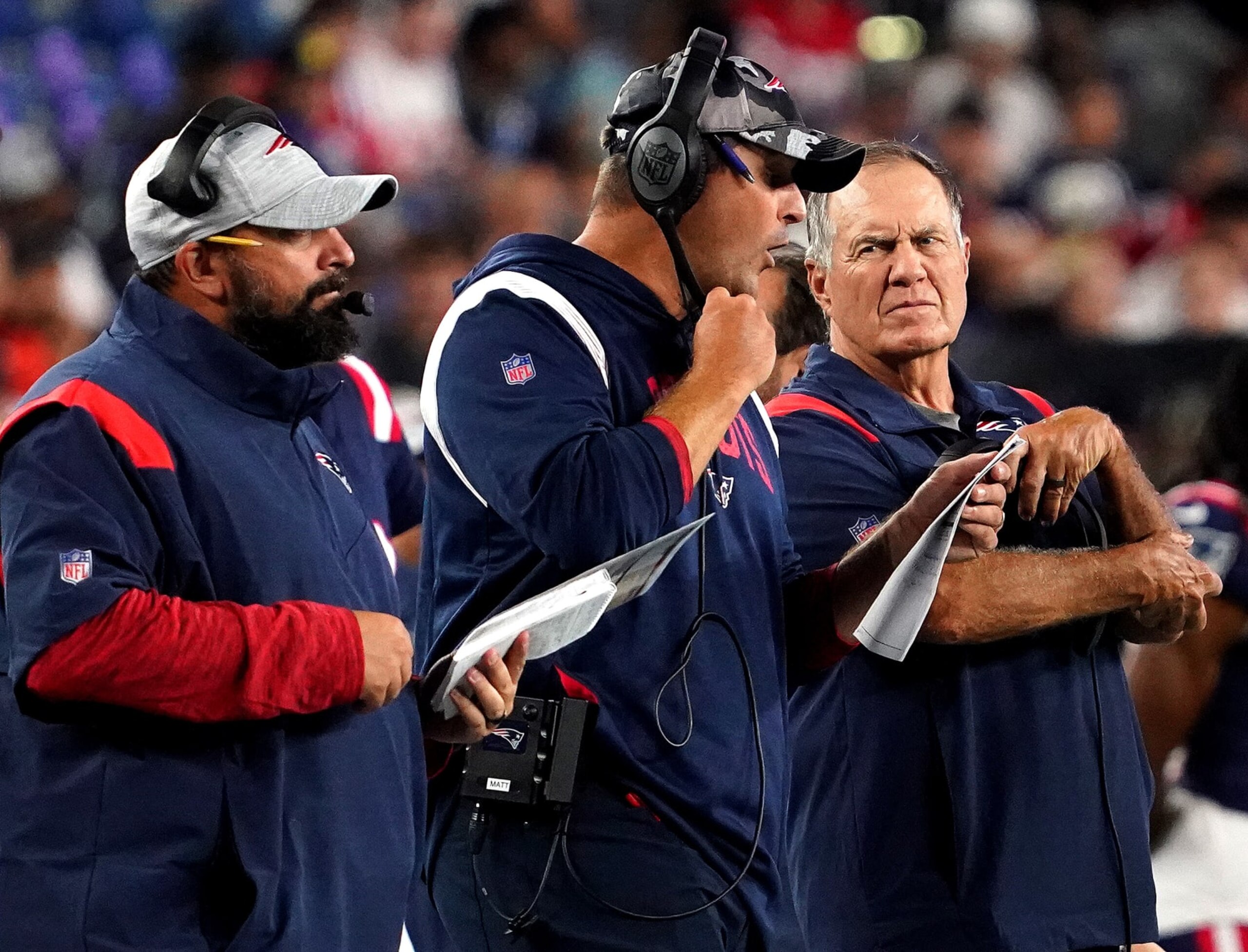 Foxborough, MA - August 11: Matt Patricia, senior football advisor/offensive line coach, Joe Judge, offensive assistant/quarterbacks coach and 
Bill Belichick, head coach of the New England Patriots, take in the teams first preseason game against the New York Giants. (Photo by Barry Chin/The Boston Globe via Getty Images)