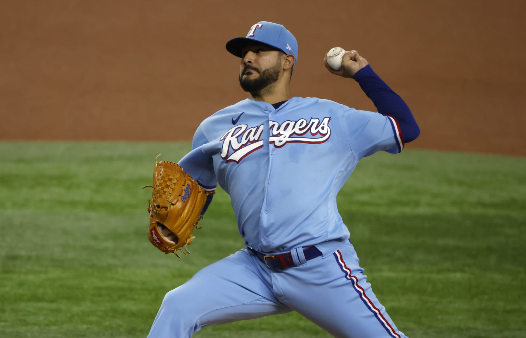 ARLINGTON, TX - AUGUST 14: Martin Perez #54 of the Texas Rangers pitches against the Seattle Mariners during the first inning at Globe Life Field on August 14, 2022 in Arlington, Texas. (Photo by Ron Jenkins/Getty Images)