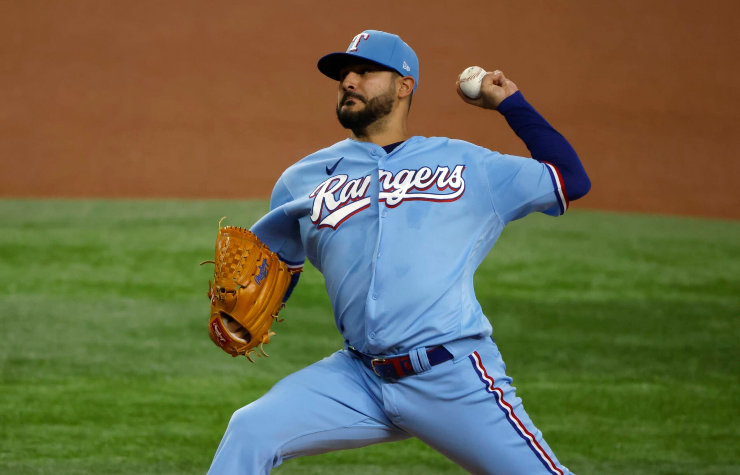 ARLINGTON, TX - AUGUST 14: Martin Perez #54 of the Texas Rangers pitches against the Seattle Mariners during the first inning at Globe Life Field on August 14, 2022 in Arlington, Texas. (Photo by Ron Jenkins/Getty Images)
