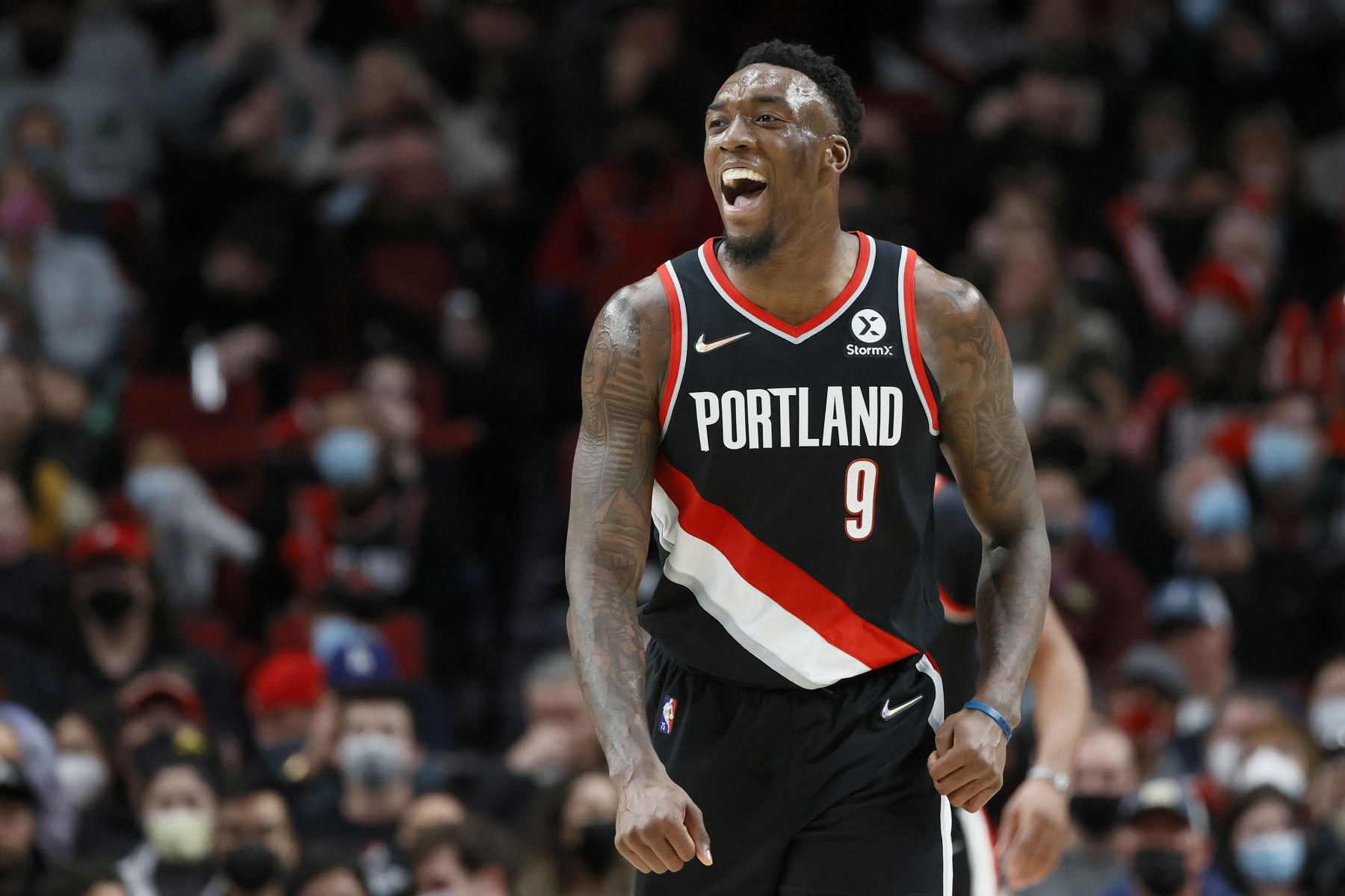 PORTLAND, OREGON - JANUARY 25: Nassir Little #9 of the Portland Trail Blazers reacts during the first half against the Minnesota Timberwolves at Moda Center on January 25, 2022 in Portland, Oregon. NOTE TO USER: User expressly acknowledges and agrees that, by downloading and/or using this photograph, User is consenting to the terms and conditions of the Getty Images License Agreement. (Photo by Steph Chambers/Getty Images)