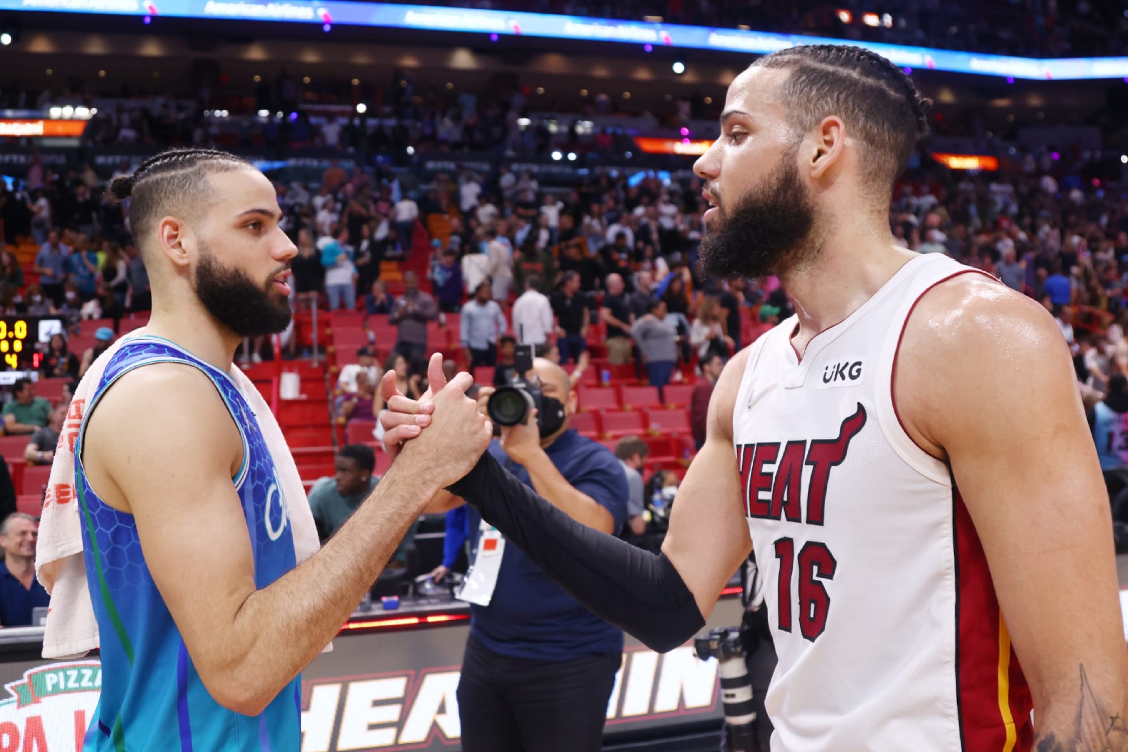 MIAMI, FLORIDA - APRIL 05: Cody Martin #11 of the Charlotte Hornets greets Caleb Martin #16 of the Miami Heat after the game at FTX Arena on April 05, 2022 in Miami, Florida. NOTE TO USER: User expressly acknowledges and agrees that, by downloading and or using this photograph, User is consenting to the terms and conditions of the Getty Images License Agreement. (Photo by Michael Reaves/Getty Images) MIAMI, FLORIDA - APRIL 05: Cody Martin #11 of the Charlotte Hornets greets Caleb Martin #16 of the Miami Heat after the game at FTX Arena on April 05, 2022 in Miami, Florida. NOTE TO USER: User expressly acknowledges and agrees that, by downloading and or using this photograph, User is consenting to the terms and conditions of the Getty Images License Agreement. (Photo by Michael Reaves/Getty Images)