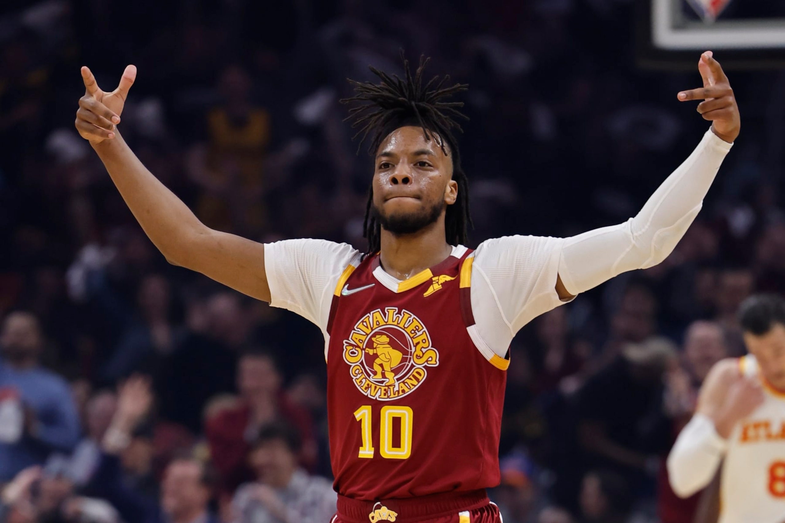 CLEVELAND, OHIO - APRIL 15: Darius Garland #10 of the Cleveland Cavaliers celebrates during the first half against the Atlanta Hawks at Rocket Mortgage Fieldhouse on April 15, 2022 in Cleveland, Ohio. NOTE TO USER: User expressly acknowledges and agrees that, by downloading and or using this photograph, User is consenting to the terms and conditions of the Getty Images License Agreement. (Photo by Rick Osentoski/Getty Images)