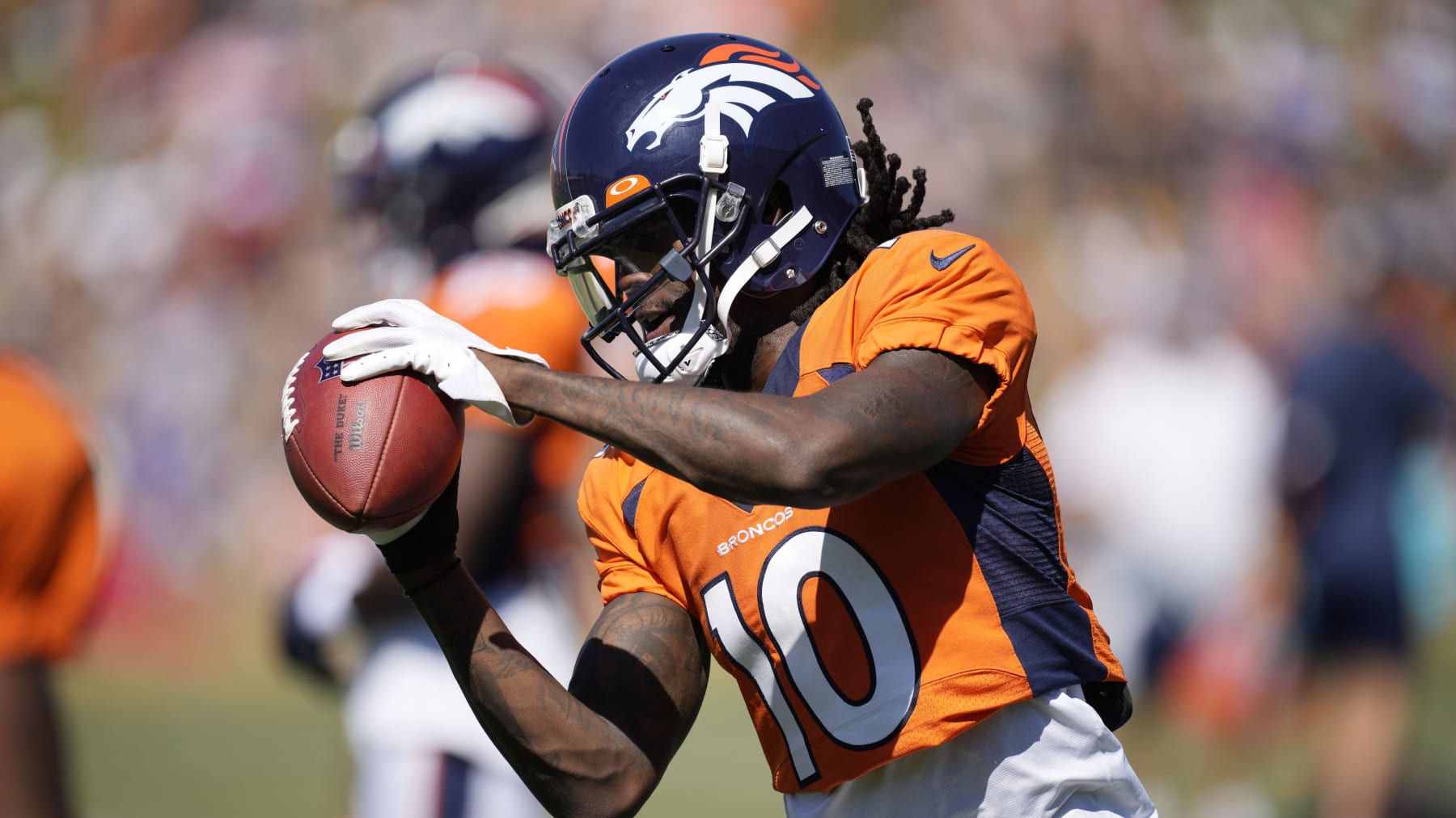 Denver Broncos wide receiver Jerry Jeudy (10) takes part in drills during the NFL football team's training camp Saturday, Aug. 6, 2022, at the Broncos' headquarters in Centennial, Colo. (AP Photo/David Zalubowski)