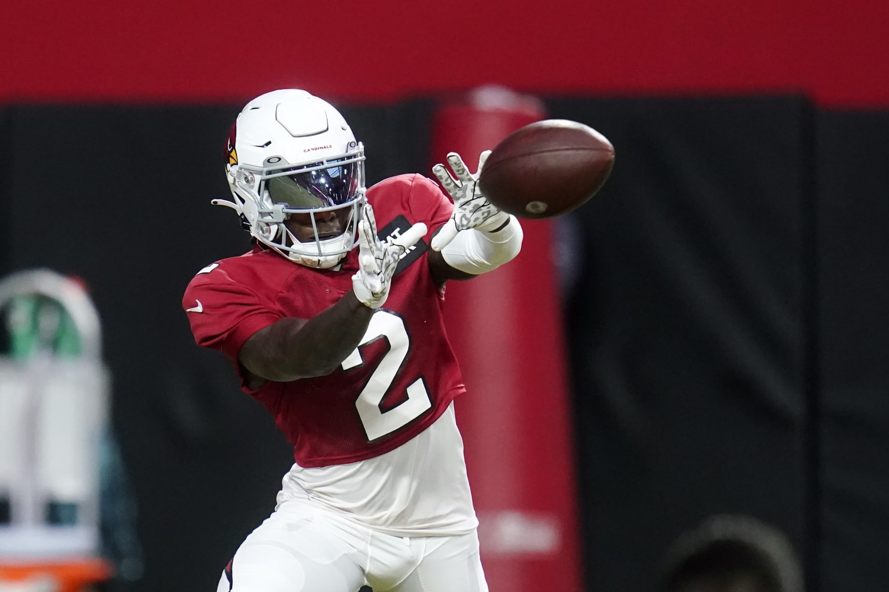 Arizona Cardinals wide receiver Marquise Brown reaches out to make a catch as he takes part in drills during the NFL football team's training camp at State Farm Stadium, Tuesday, Aug. 9, 2022, in Glendale, Ariz. (AP Photo/Ross D. Franklin)