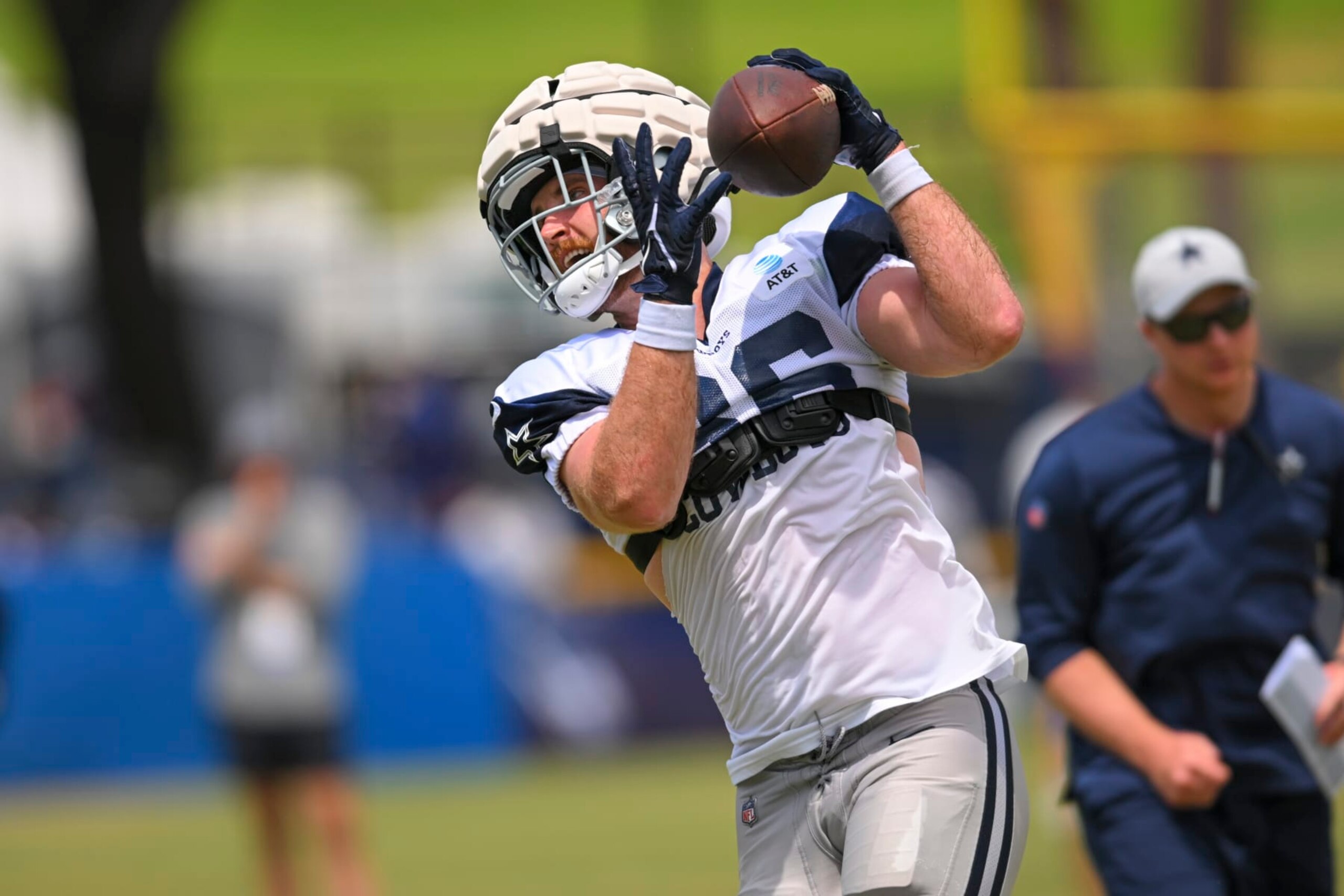 Dallas Cowboys tight end Dalton Schultz makes a reception during a drill at NFL football training camp, Monday, Aug. 1, 2022, in Oxnard, Calif. (AP Photo/Gus Ruelas)
