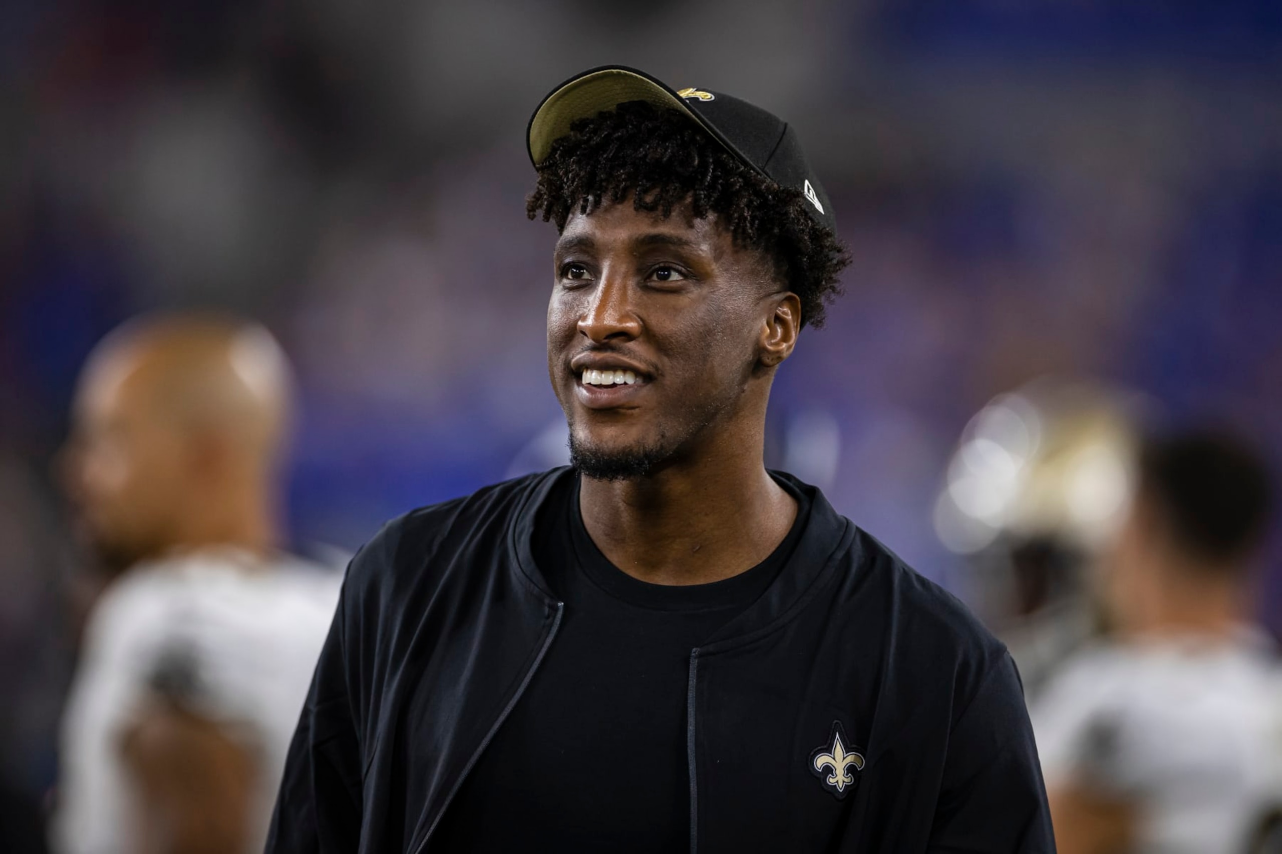 BALTIMORE, MD - AUGUST 14: Michael Thomas #13 of the New Orleans Saints looks on from the sidelines during the second half of a preseason game against the Baltimore Ravens at M&T Bank Stadium on August 14, 2021 in Baltimore, Maryland. (Photo by Scott Taetsch/Getty Images)