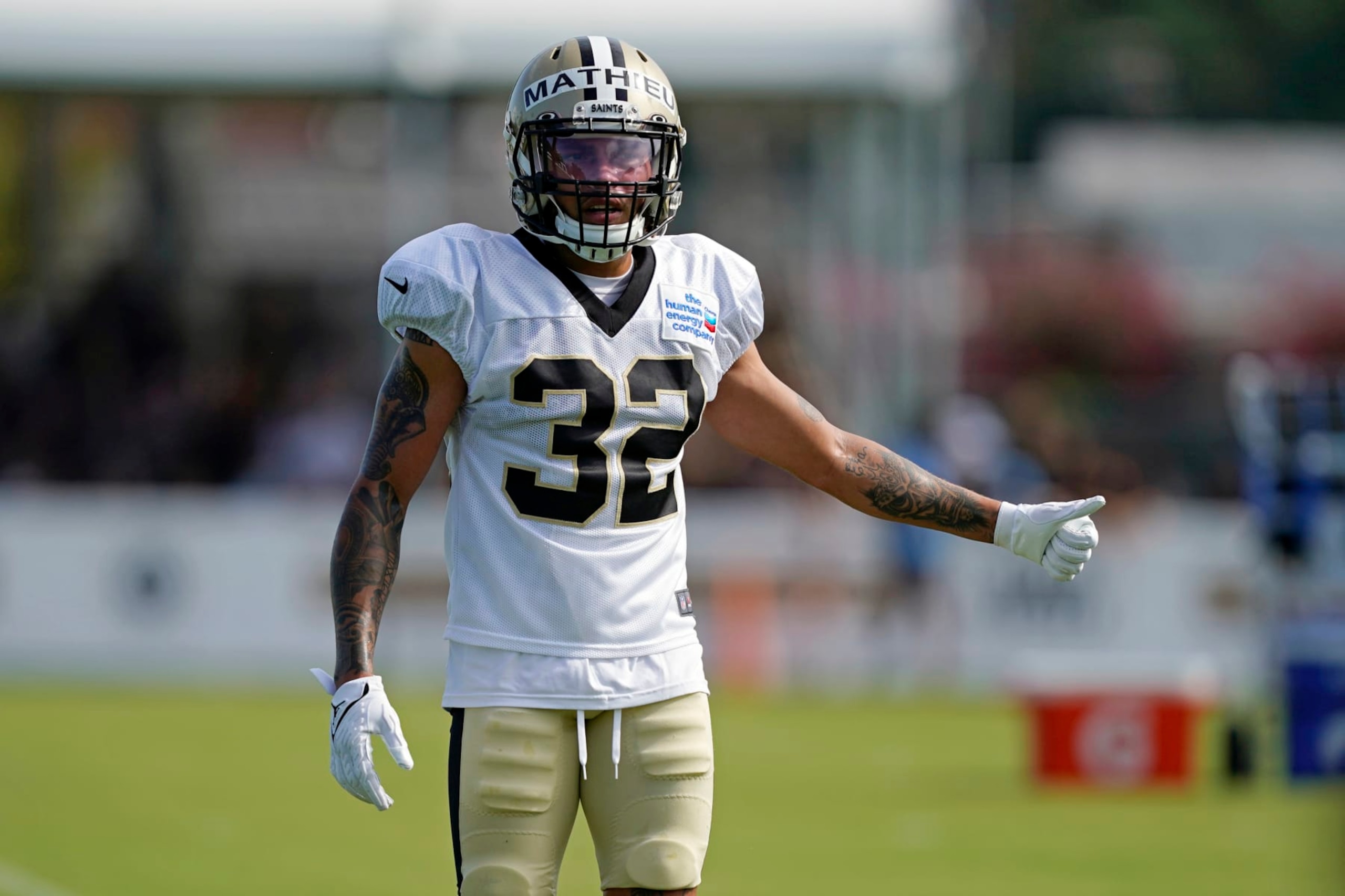 New Orleans Saints safety Tyrann Mathieu (32) walks between drills during training camp at their NFL football training facility in Metairie, La., Thursday, Aug. 4, 2022. (AP Photo/Gerald Herbert) New Orleans Saints safety Tyrann Mathieu (32) walks between drills during training camp at their NFL football training facility in Metairie, La., Thursday, Aug. 4, 2022. (AP Photo/Gerald Herbert)