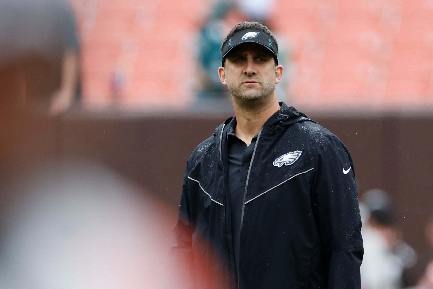 Philadelphia Eagles head coach Nick Sirianni watches the team warm up before an NFL preseason football game against the Cleveland Browns in Cleveland, Sunday, Aug. 21, 2022. (AP Photo/Ron Schwane)