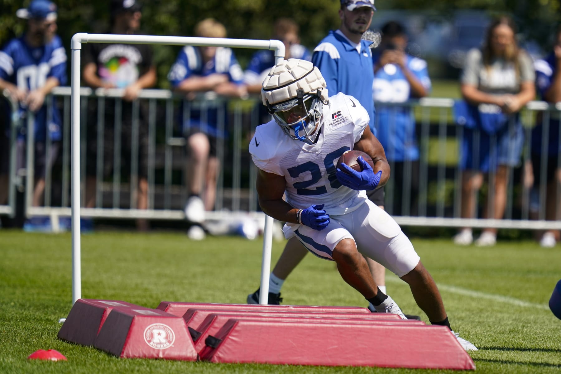 Indianapolis Colts running back Jonathan Taylor (28) runs a drill during a joint practice with the Detroit Lions at the NFL team's football training camp in Westfield, Ind., Wednesday, Aug. 17, 2022. (AP Photo/Michael Conroy)