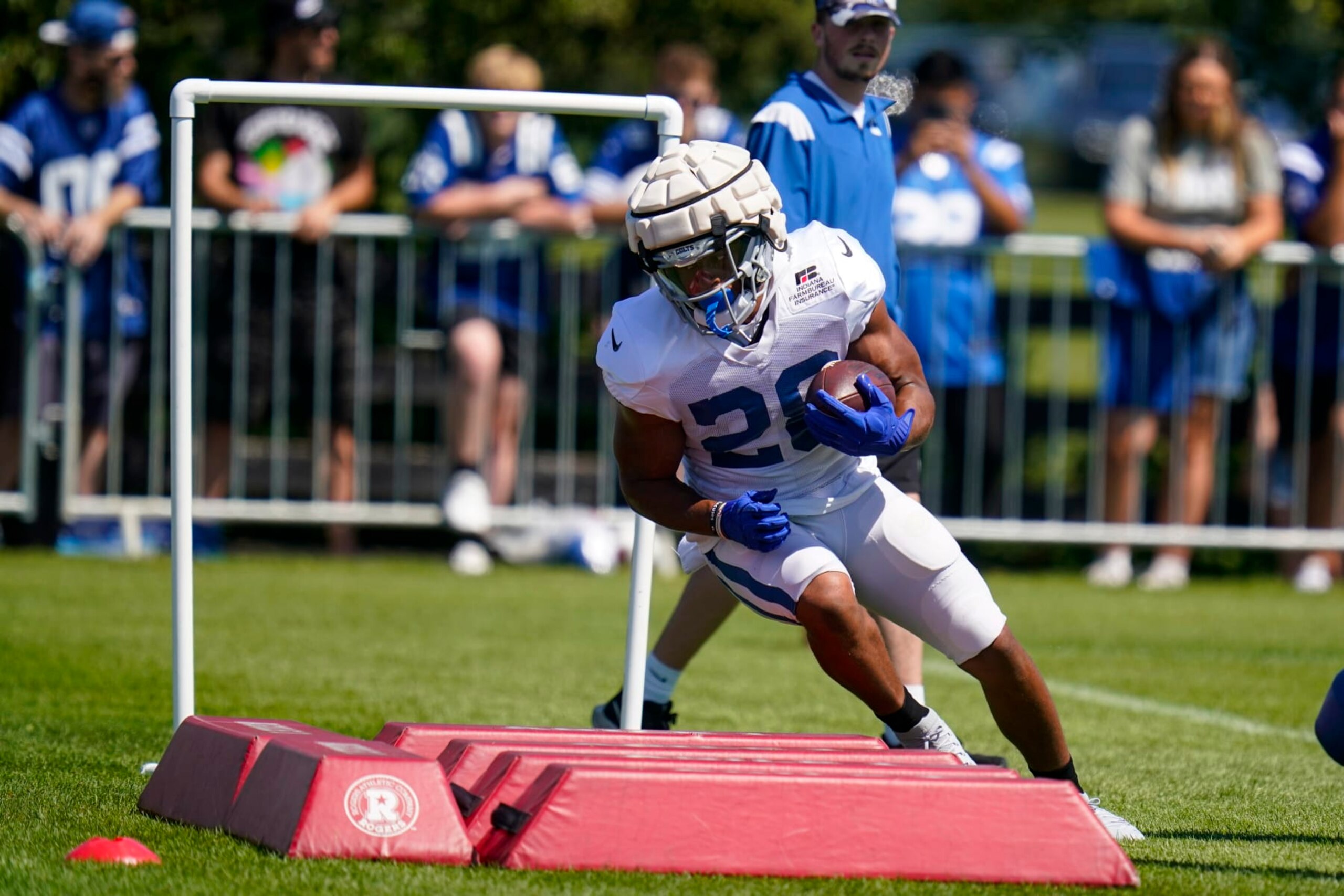 Indianapolis Colts running back Jonathan Taylor (28) runs a drill during a joint practice with the Detroit Lions at the NFL team's football training camp in Westfield, Ind., Wednesday, Aug. 17, 2022. (AP Photo/Michael Conroy) Indianapolis Colts running back Jonathan Taylor (28) runs a drill during a joint practice with the Detroit Lions at the NFL team's football training camp in Westfield, Ind., Wednesday, Aug. 17, 2022. (AP Photo/Michael Conroy)