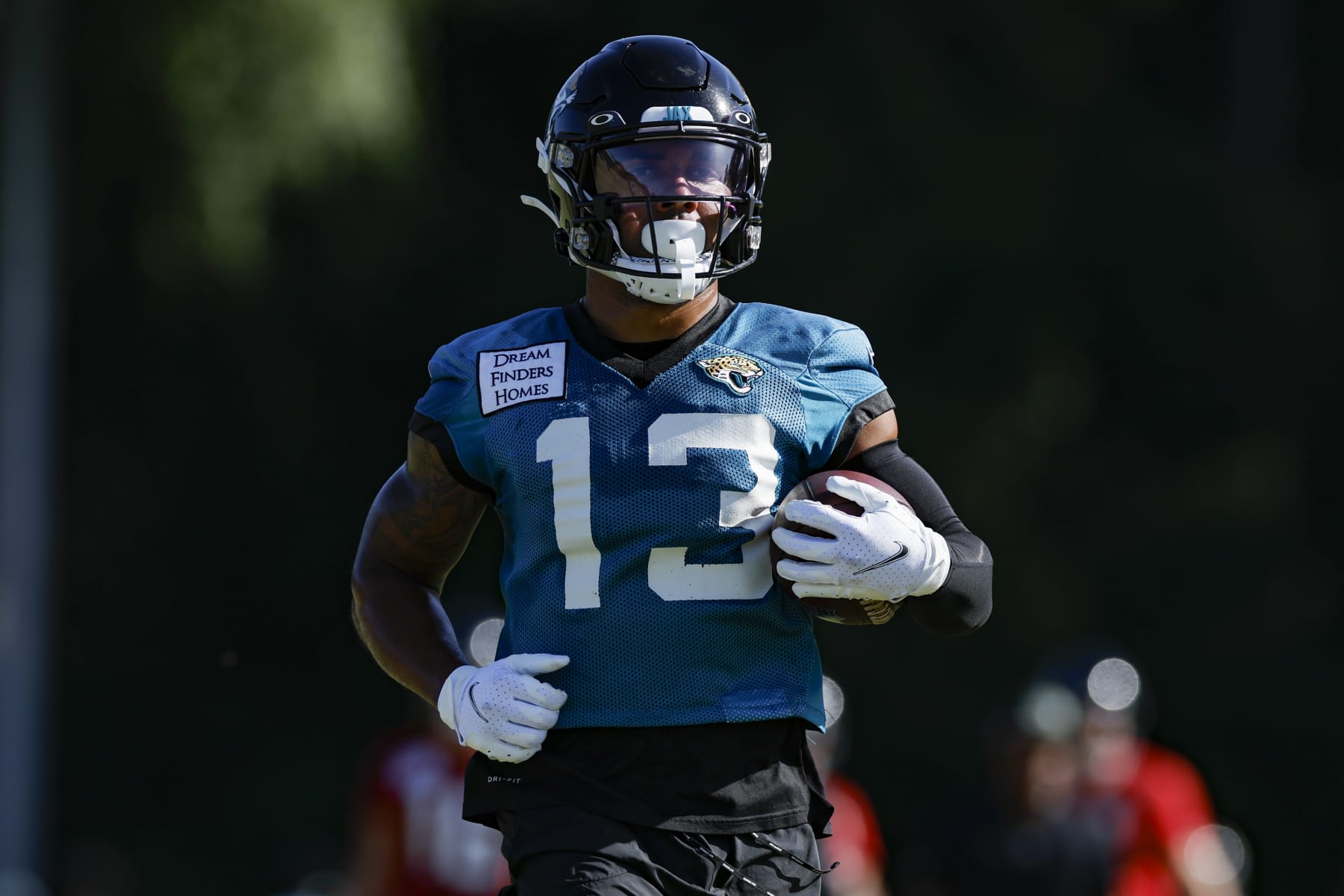 JACKSONVILLE, FL - JULY 27: Jacksonville Jaguars wide receiver Christian Kirk (13) runs with the ball during training camp on July 27, 2022 at Episcopal School of Jacksonville in Jacksonville, Fl. (Photo by David Rosenblum/Icon Sportswire via Getty Images)