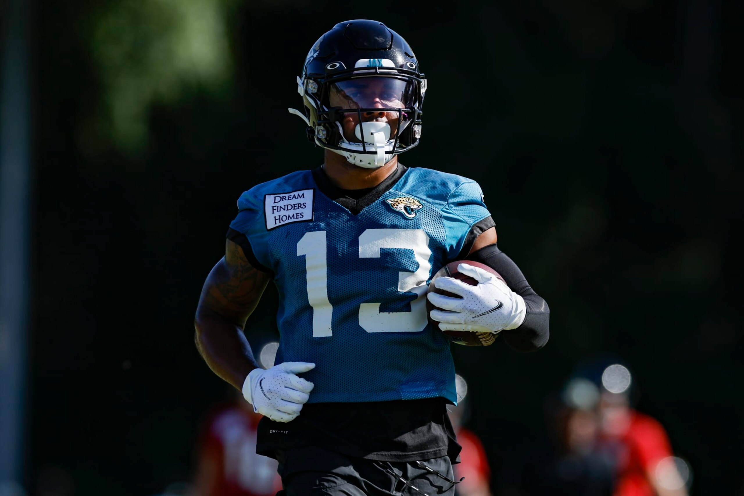 JACKSONVILLE, FL - JULY 27: Jacksonville Jaguars wide receiver Christian Kirk (13) runs with the ball during training camp on July 27, 2022 at Episcopal School of Jacksonville in Jacksonville, Fl. (Photo by David Rosenblum/Icon Sportswire via Getty Images)