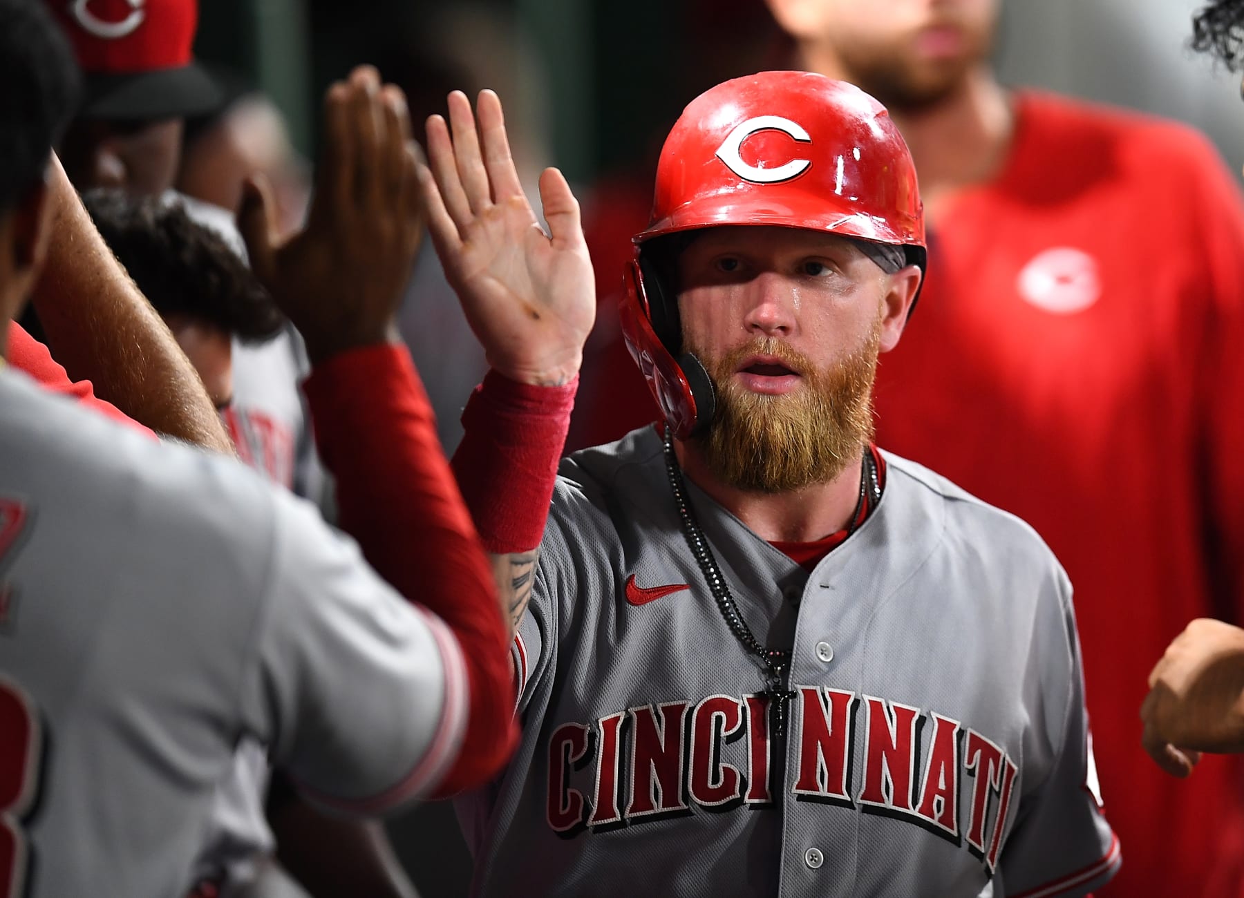 PITTSBURGH, PA - AUGUST 19:  Jake Fraley #27 of the Cincinnati Reds celebrates after scoring during the eighth inning against the Pittsburgh Pirates at PNC Park on August 19, 2022 in Pittsburgh, Pennsylvania. (Photo by Joe Sargent/Getty Images)