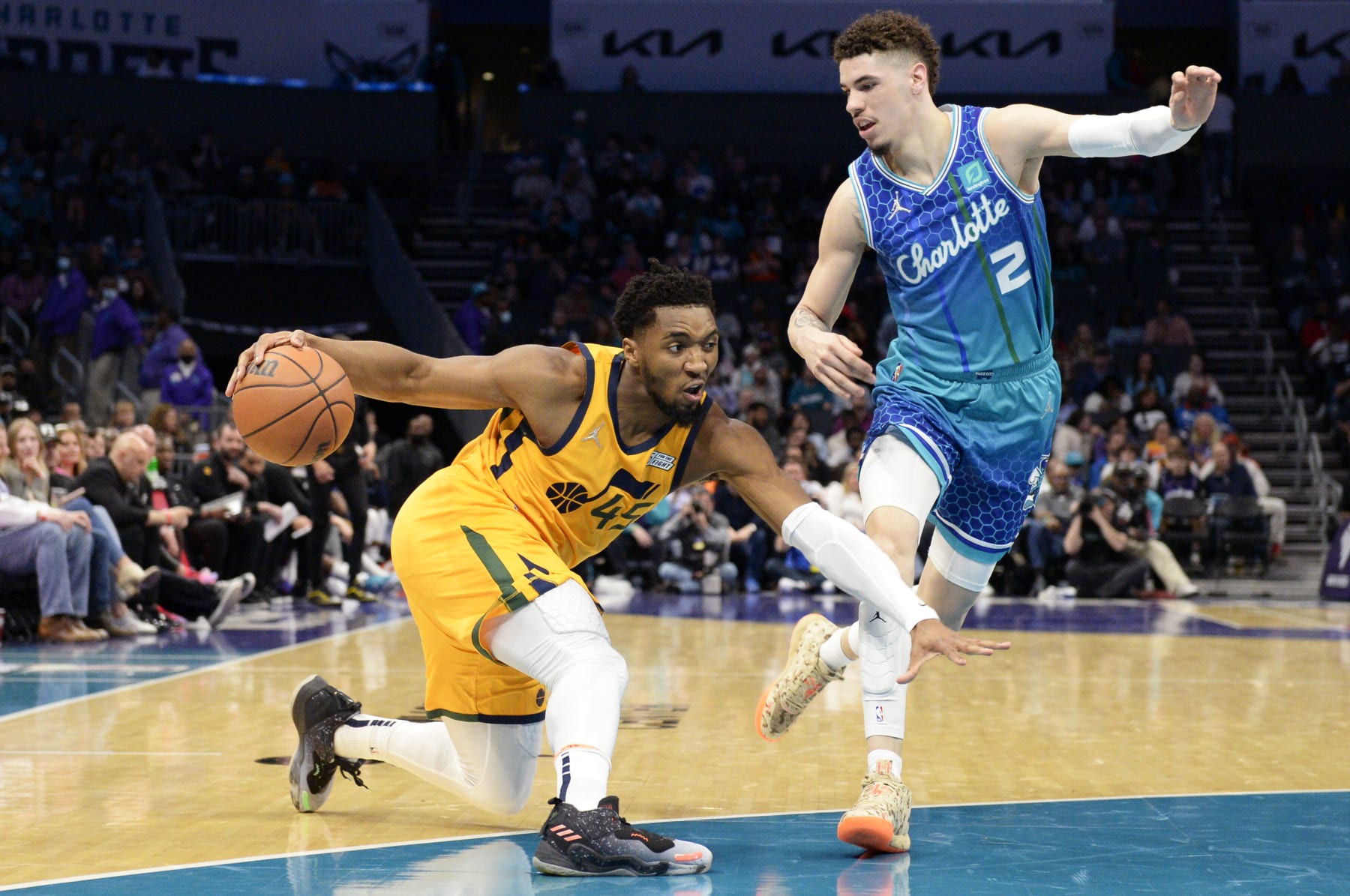 CHARLOTTE, NORTH CAROLINA - MARCH 25: Donovan Mitchell #45 of the Utah Jazz fakes out LaMelo Ball #2 of the Charlotte Hornets during the second quarter at Spectrum Center on March 25, 2022 in Charlotte, North Carolina. NOTE TO USER: User expressly acknowledges and agrees that, by downloading and or using this photograph, User is consenting to the terms and conditions of the Getty Images License Agreement. (Photo by Eakin Howard/Getty Images)