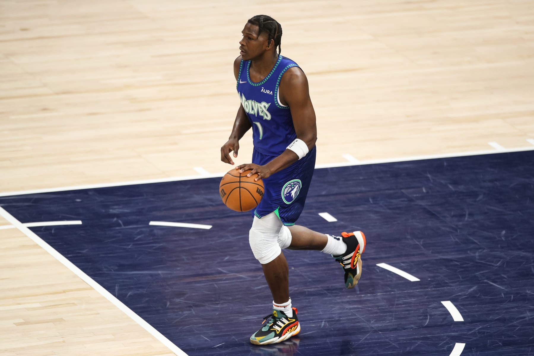 MINNEAPOLIS, MN - APRIL 29: Anthony Edwards #1 of the Minnesota Timberwolves dribbles the ball against the Memphis Grizzlies in the first quarter of the game during Game Six of the Western Conference First Round at Target Center on April 29, 2022 in Minneapolis, Minnesota. The Grizzlies defeated the Timberwolves 114-106 to advance to the Western Conference Semifinals. NOTE TO USER: User expressly acknowledges and agrees that, by downloading and or using this Photograph, user is consenting to the terms and conditions of the Getty Images License Agreement. (Photo by David Berding/Getty Images)