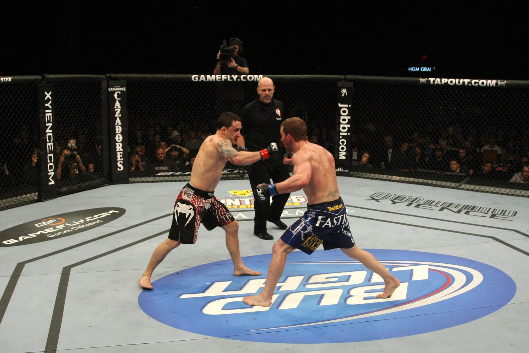 LAS VEGAS - JANUARY 01:  (L-R) Frankie Edgar punches towards Gray Maynard at UFC 125: Resolution at the MGM Grand Garden Arena on January 1, 2011 in Las Vegas, Nevada.  (Photo by Donald Miralle/Zuffa LLC/Zuffa LLC via Getty Images)