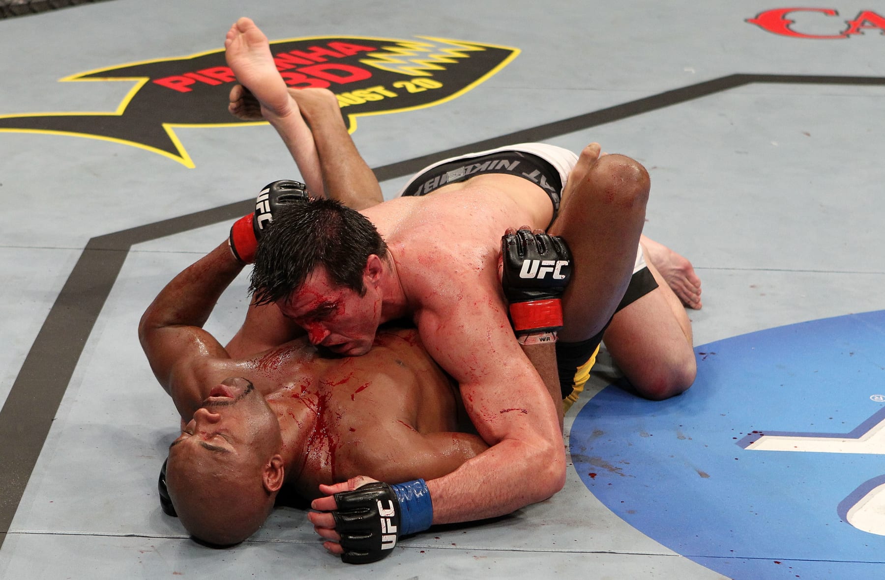 OAKLAND, CA - AUGUST 07:  Chael Sonnen and Anderson Silva grapple during the UFC Middleweight Championship bout at Oracle Arena on August 7, 2010 in Oakland, California.  (Photo by Josh Hedges/Zuffa LLC/Zuffa LLC via Getty Images)