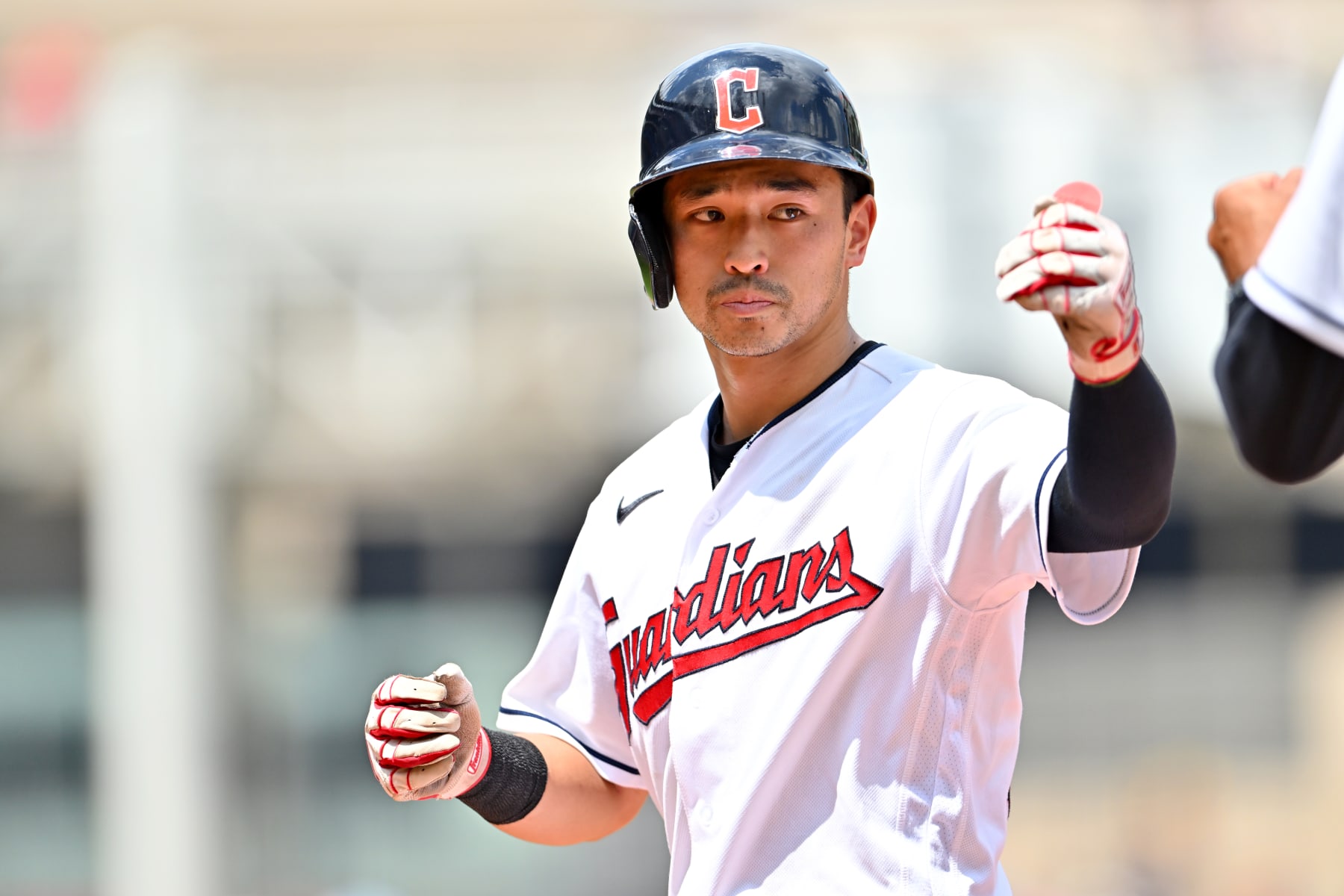 CLEVELAND, OHIO - AUGUST 07: Steven Kwan #38 of the Cleveland Guardians celebrates after hitting a single during the third inning against the Houston Astros at Progressive Field on August 07, 2022 in Cleveland, Ohio. (Photo by Jason Miller/Getty Images)
