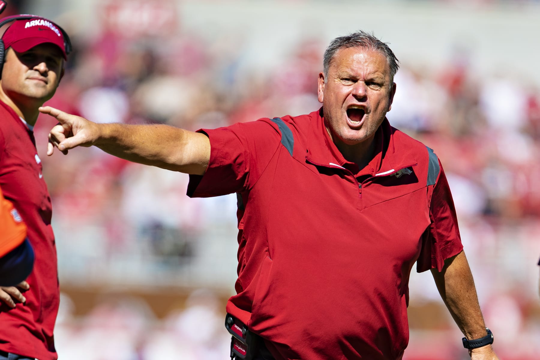 FAYETTEVILLE, ARKANSAS - OCTOBER 16:  Head Coach Sam Pittman of the Arkansas Razorbacks talks with the officials during a game against the Auburn Tigers at Donald W. Reynolds Stadium on October 16, 2021 in Fayetteville, Arkansas. The Tigers defeated the Razorbacks 38-23.  (Photo by Wesley Hitt/Getty Images)