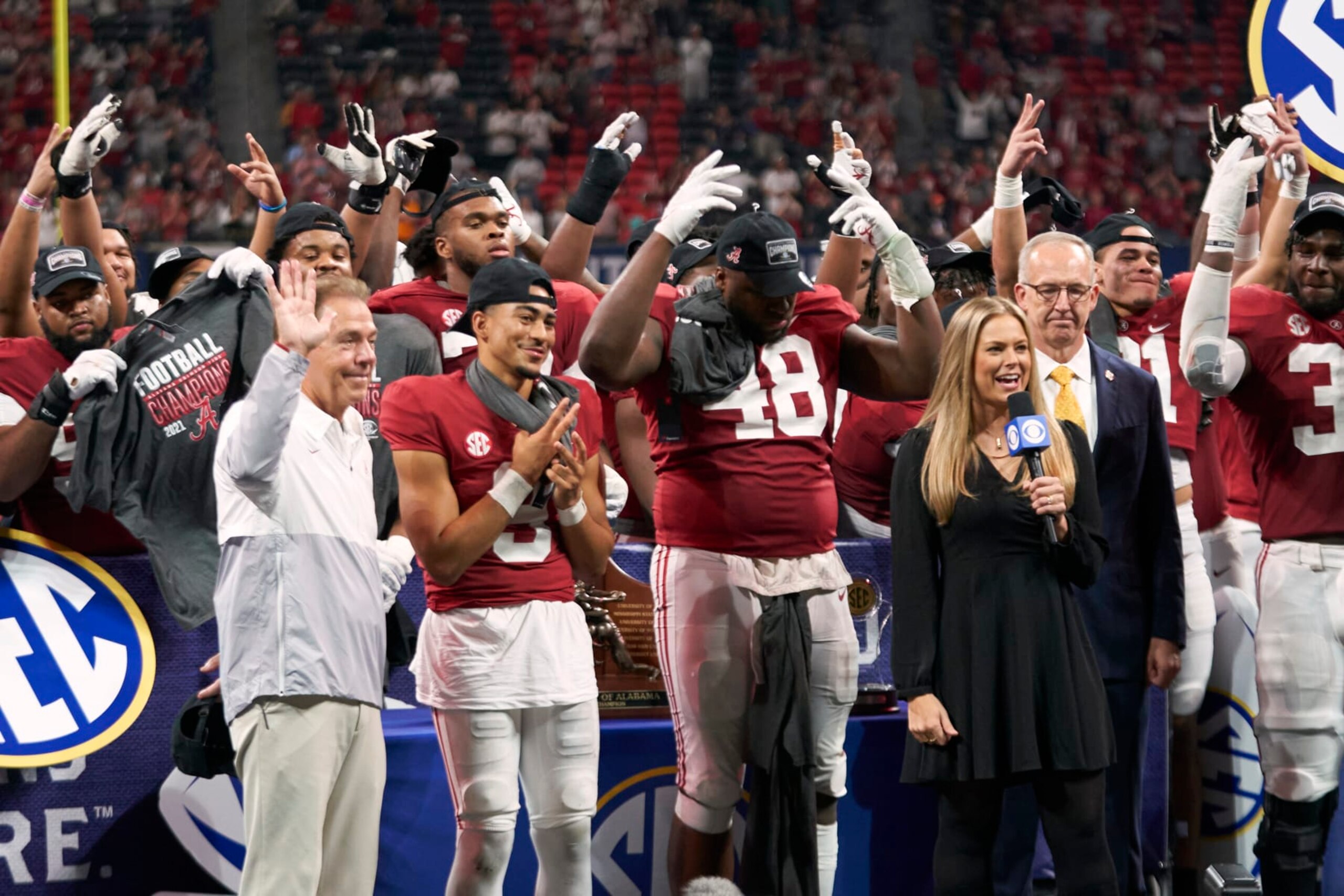 College Football: SEC Championship: Alabama coach Nick Saban with QB Bryce Young (9) and Phidarian Mathis (48) after winning game vs Georgia at Mercedes-Benz Stadium. Atlanta, GA 12/4/2021 CREDIT: Kevin D. Liles (Photo by Kevin D. Liles/Sports Illustrated via Getty Images) (Set Number: X163878 TK1)