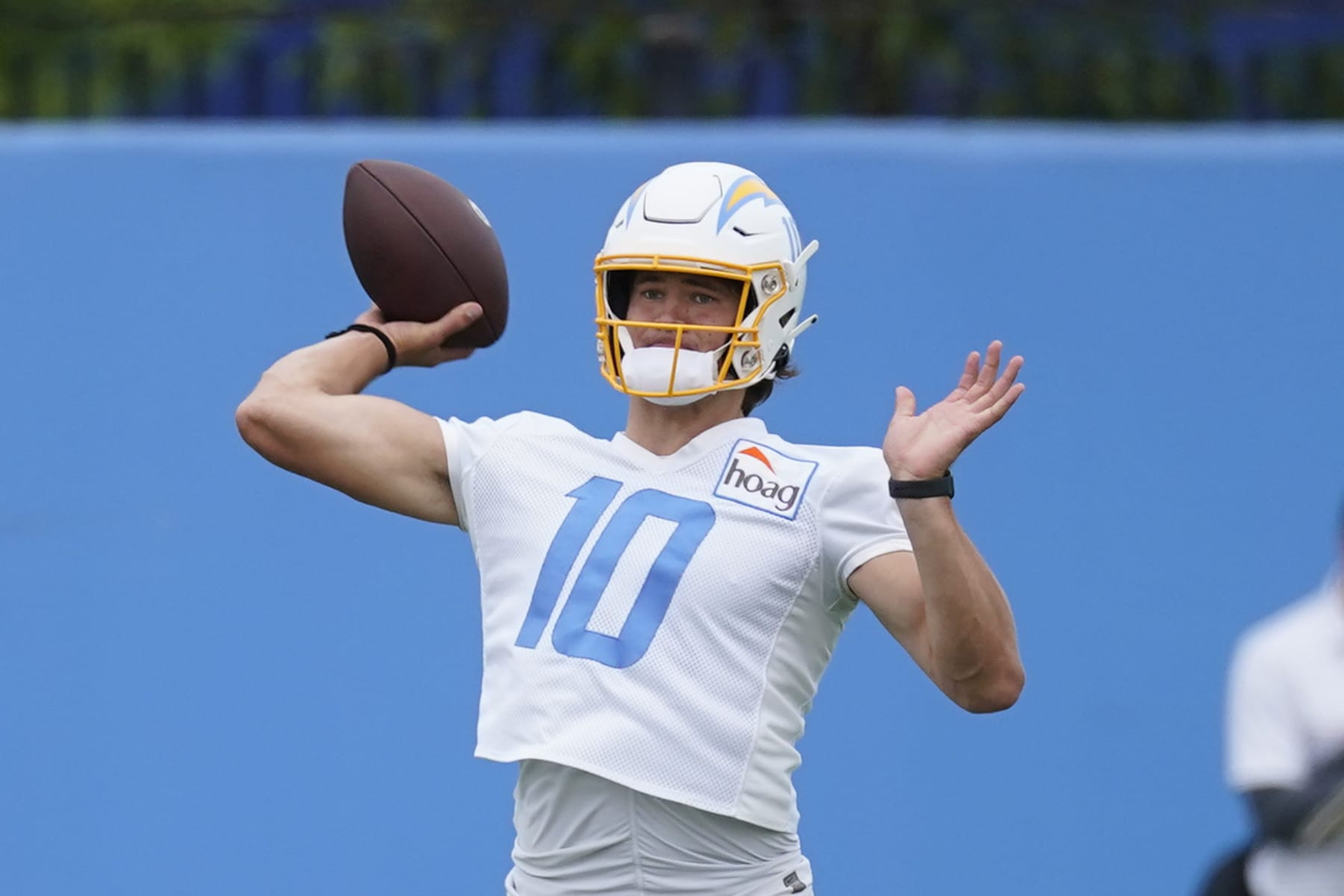 Los Angeles Chargers quarterback Justin Herbert participates in drills during an NFL football practice at the Chargers practice facility in Costa Mesa, Calif., Monday, May 23, 2022. (AP Photo/Ashley Landis)