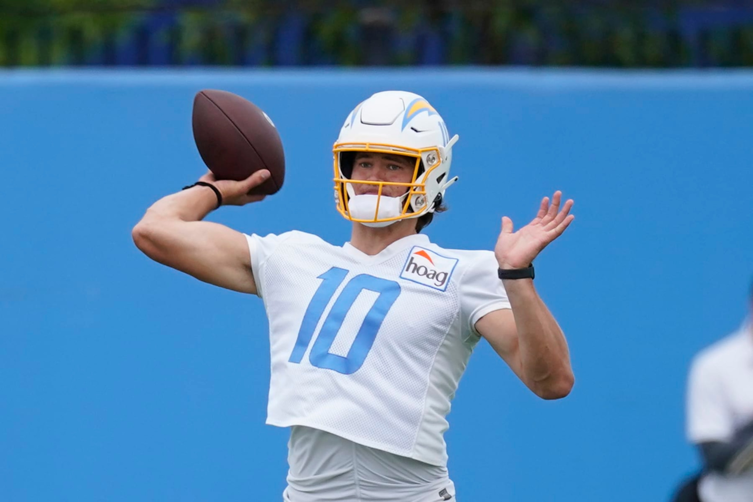 Los Angeles Chargers quarterback Justin Herbert participates in drills during an NFL football practice at the Chargers practice facility in Costa Mesa, Calif., Monday, May 23, 2022. (AP Photo/Ashley Landis)