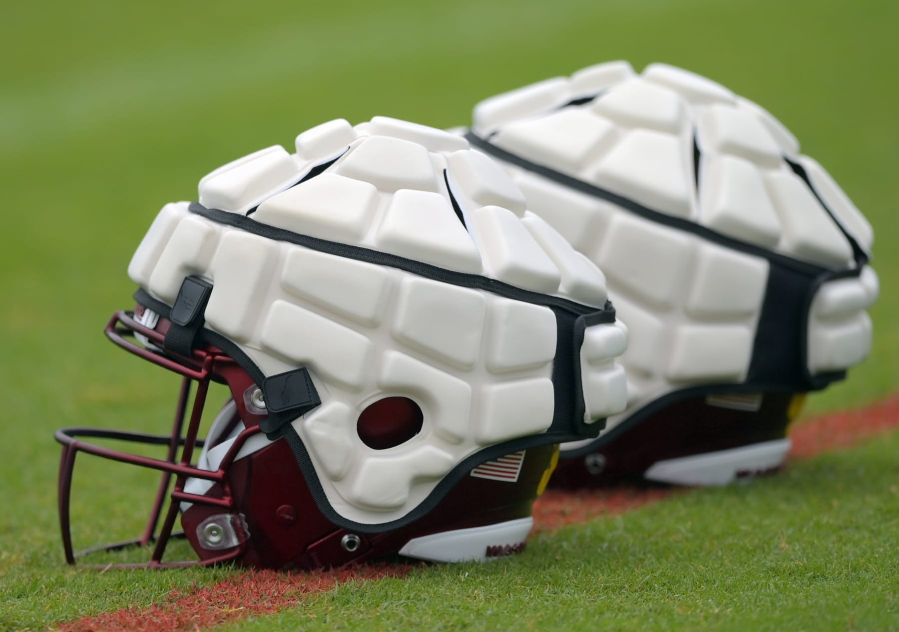 ASHBURN, VA- JULY 29:  Padded helmets for line mens and running backs during day 3 of the Washington Commanders summer training camp on July 29, 2022 in Ashburn, VA. (Photo by John McDonnell/The Washington Post via Getty Images)