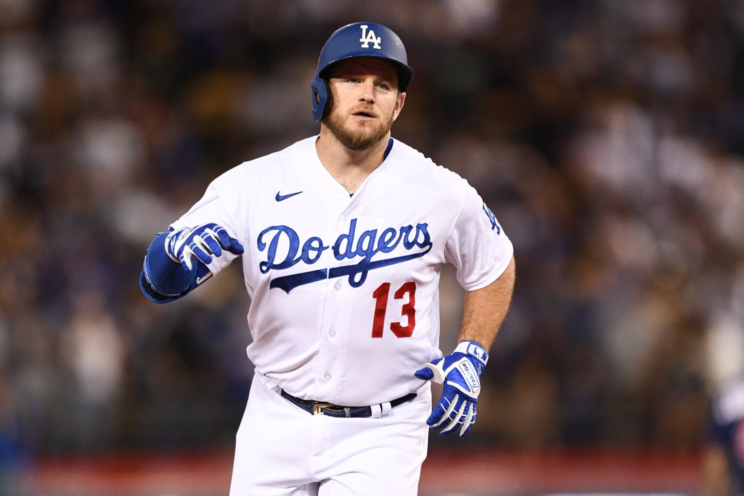 LOS ANGELES, CA - AUGUST 09: Los Angeles Dodgers third baseman Max Muncy (13) circles the bases after his solo home run during the MLB game between the Minnesota Twins and the Los Angeles Dodgers on August 9, 2022 at Dodger Stadium in Los Angeles, CA. (Photo by Brian Rothmuller/Icon Sportswire via Getty Images)