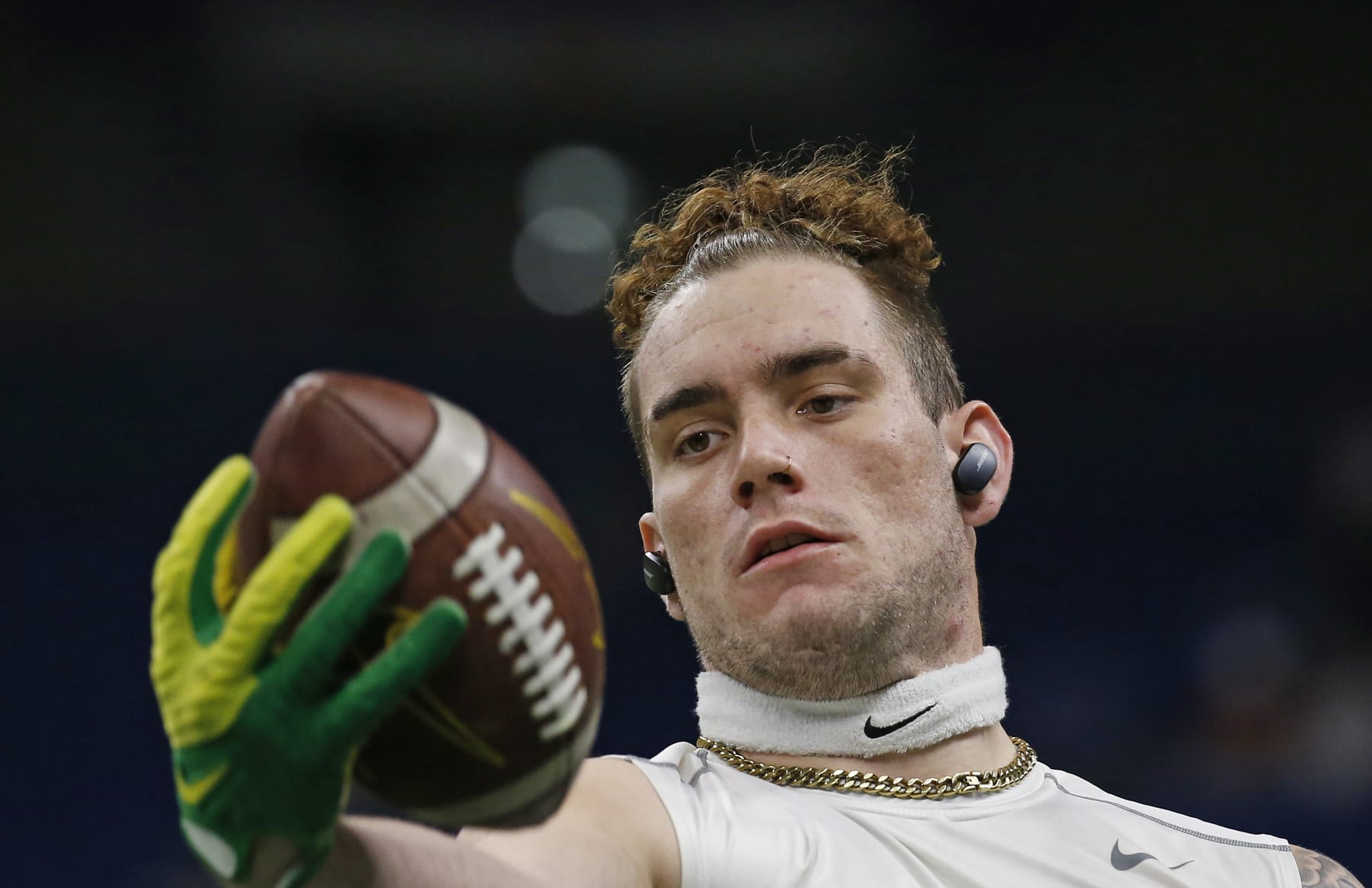 SAN ANTONIO, TX - DECEMBER 29: Spencer Webb #18 of the Oregon Ducks catches a pass before the start of their game against the Oklahoma Sooners in the Valero Alamo Bowl at the Alamodome on December 29, 2021 in San Antonio, Texas. (Photo by Ronald Cortes/Getty Images)