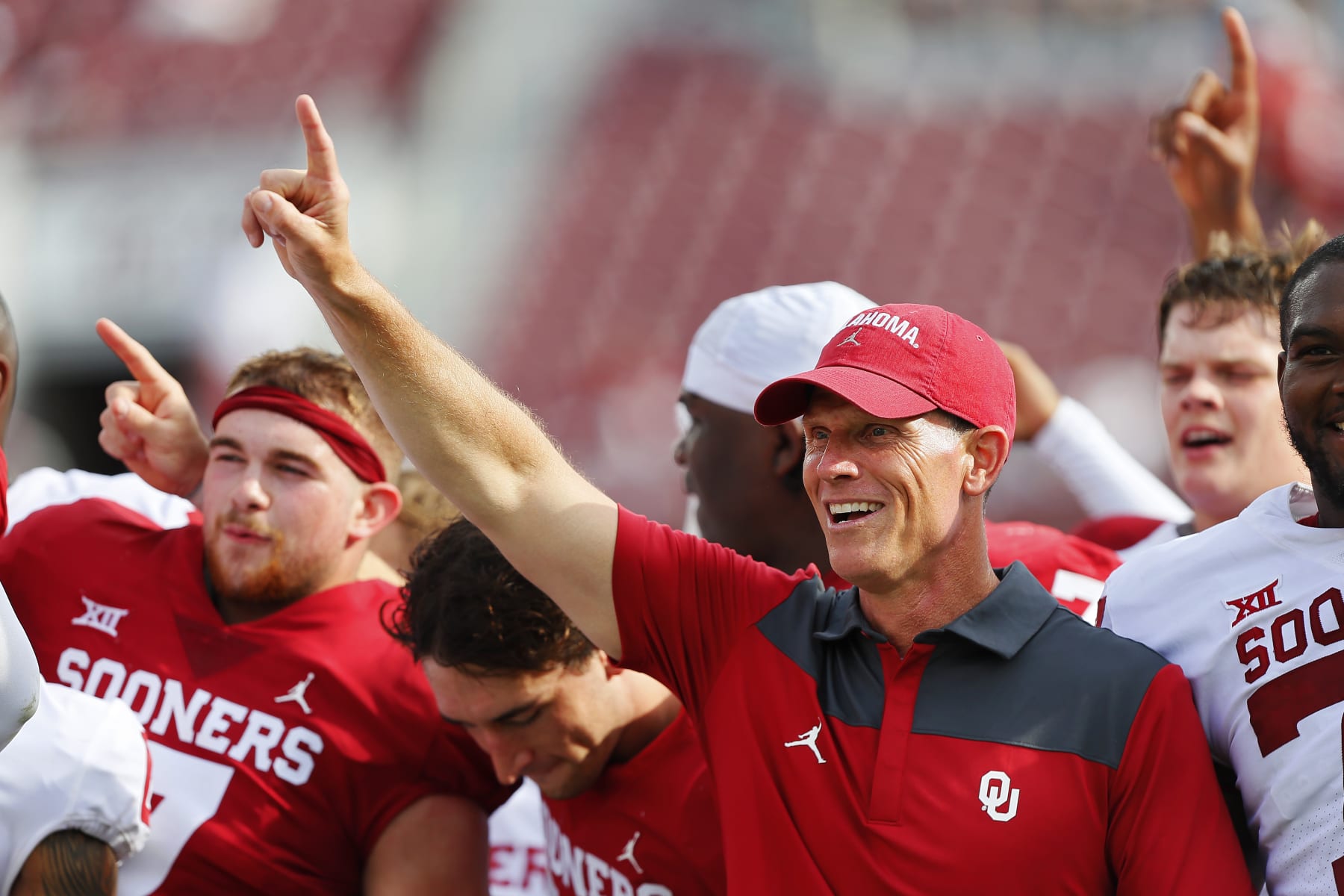 NORMAN, OK - APRIL 23: Head coach Brent Venables of the Oklahoma Sooners leads the team in the alma mater after their spring game at Gaylord Family Oklahoma Memorial Stadium on April 23, 2022 in Norman, Oklahoma. (Photo by Brian Bahr/Getty Images)