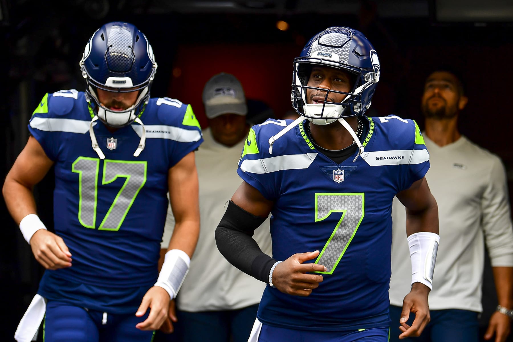 SEATTLE, WASHINGTON - AUGUST 18: Geno Smith #7 of the Seattle Seahawks runs onto the field prior to the preseason game against the Chicago Bears at Lumen Field on August 18, 2022 in Seattle, Washington. (Photo by Jane Gershovich/Getty Images)