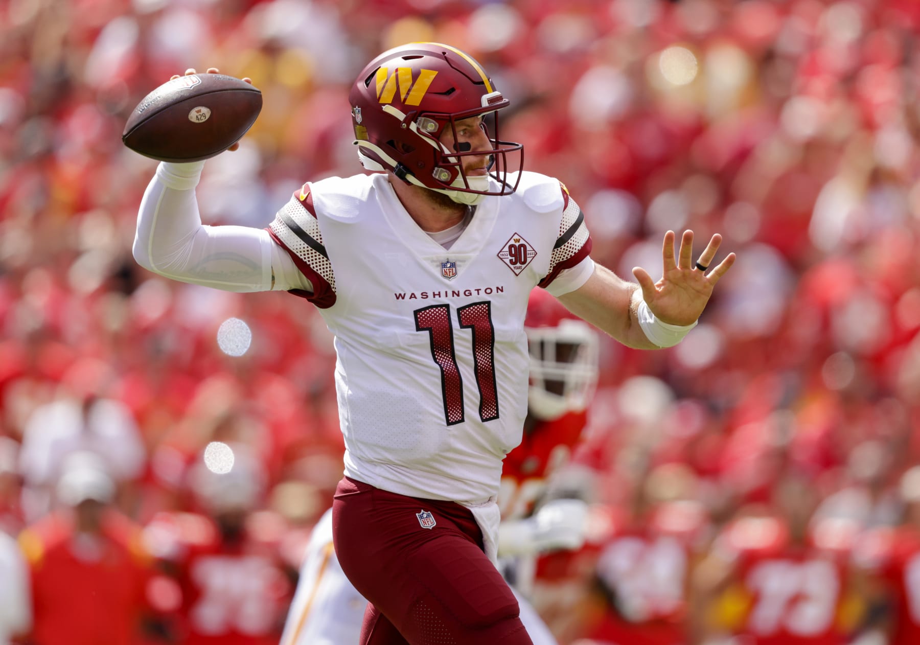 KANSAS CITY, MO - AUGUST 20: Carson Wentz #11 of the Washington Commanders throws a first quarter pass against the Kansas City Chiefs at Arrowhead Stadium on August 20, 2022 in Kansas City, Missouri. (Photo by David Eulitt/Getty Images)