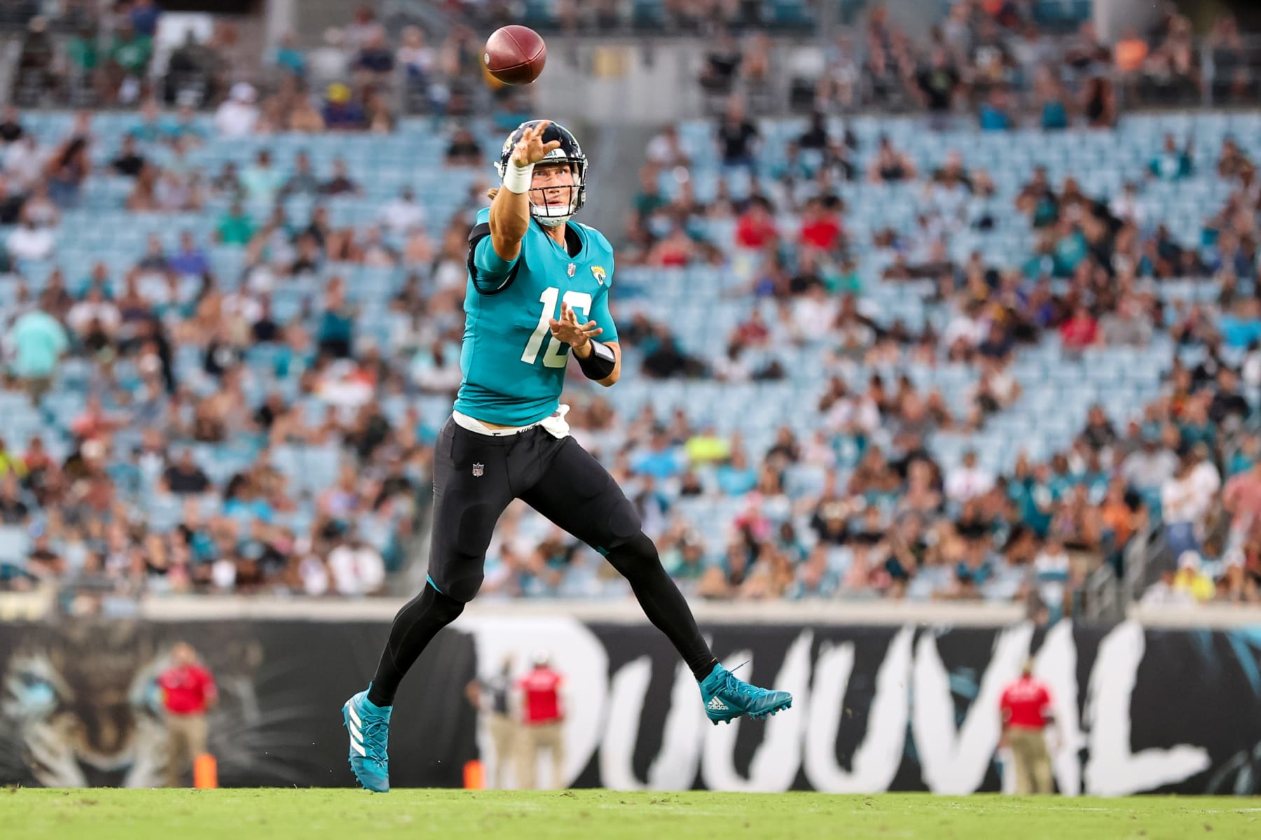 JACKSONVILLE, FL - AUGUST 12: Trevor Lawrence #16 of the Jacksonville Jaguars throws a touchdown against the Cleveland Browns during a football game at TIAA Bank Field on August 12, 2022 in Jacksonville, Florida. (Photo by Mike Carlson/Getty Images)