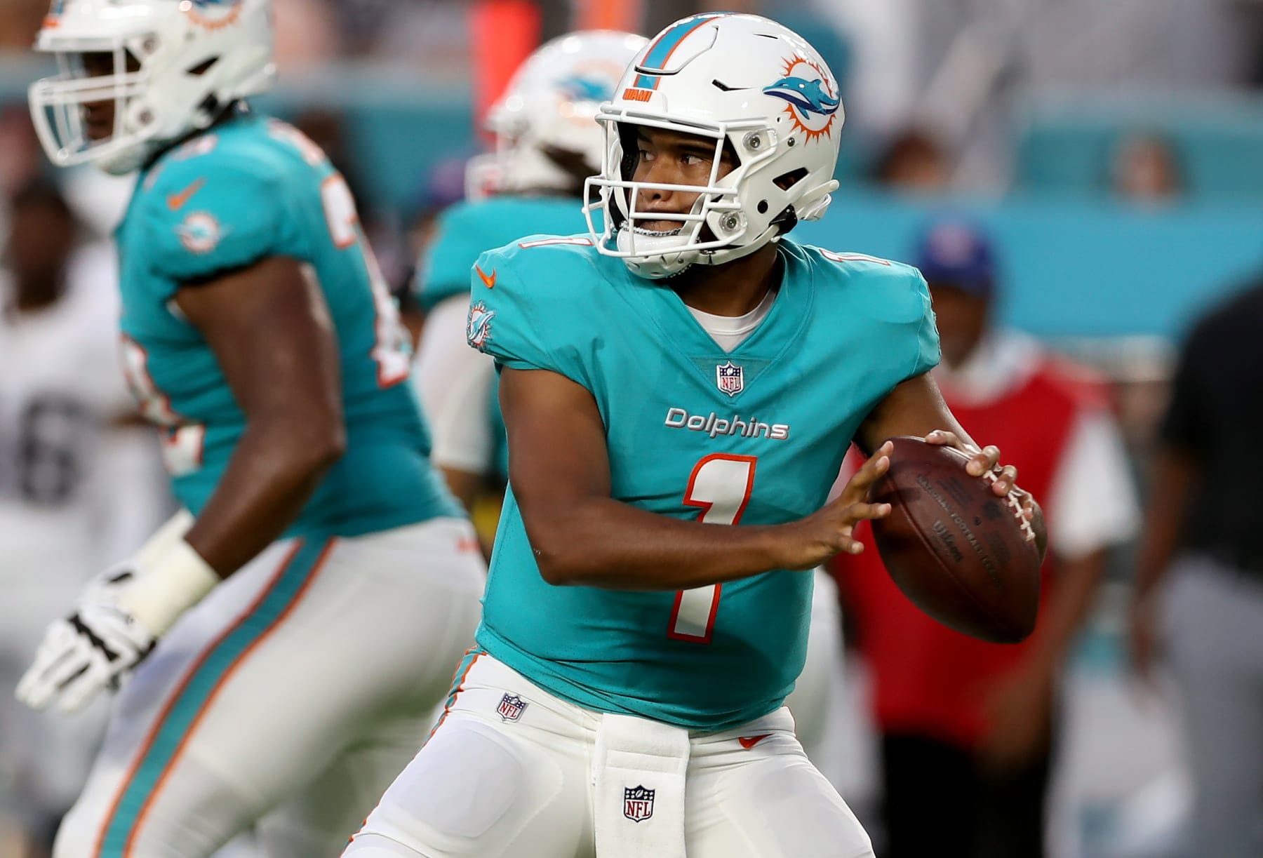 MIAMI GARDENS, FLORIDA - AUGUST 20: Tua Tagovailoa #1 of the Miami Dolphins throws a pass during the first quarter against the Las Vegas Raiders at Hard Rock Stadium on August 20, 2022 in Miami Gardens, Florida. (Photo by Megan Briggs/Getty Images)