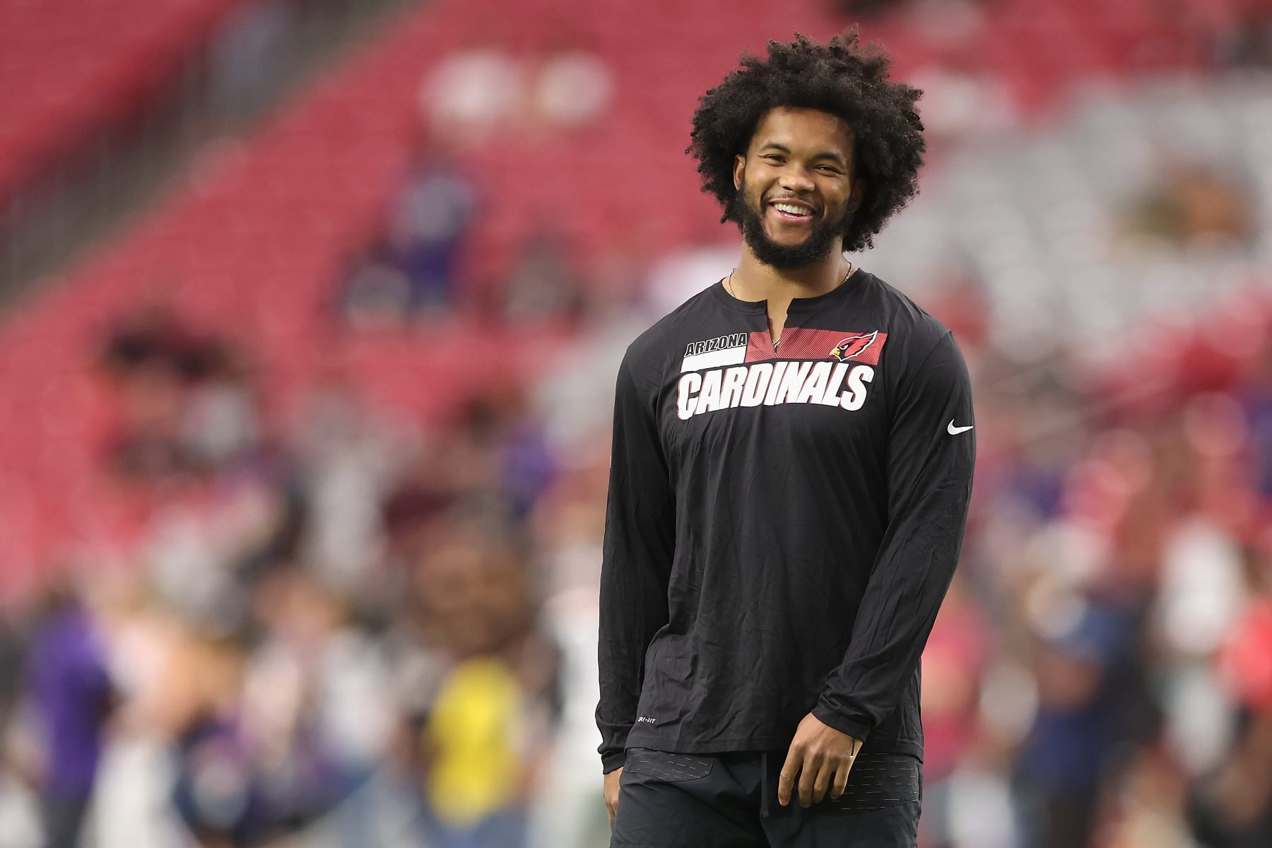 GLENDALE, ARIZONA - AUGUST 21: Quarterback Kyler Murray #1 of the Arizona Cardinals walks on the field before the NFL preseason game against the Baltimore Ravens at State Farm Stadium on August 21, 2022 in Glendale, Arizona. The Ravens defeated the Cardinals 24-17. (Photo by Christian Petersen/Getty Images)