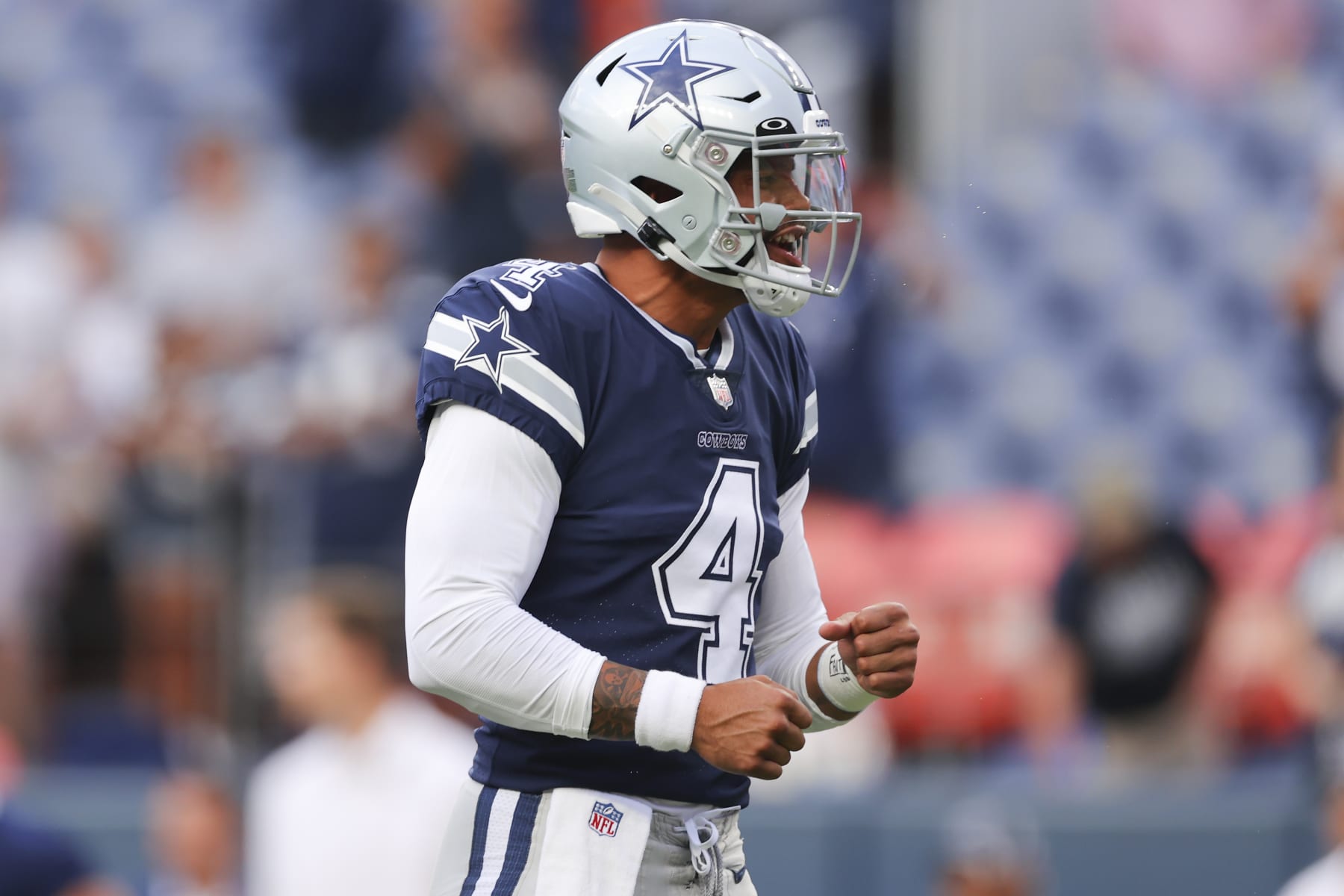 DENVER, CO - AUGUST 13: Dak Prescott #4 of the Dallas Cowboys reacts before the game against the Denver Broncos at Empower Field At Mile High on August 13, 2022 in Denver, Colorado. (Photo by C. Morgan Engel/Getty Images)
